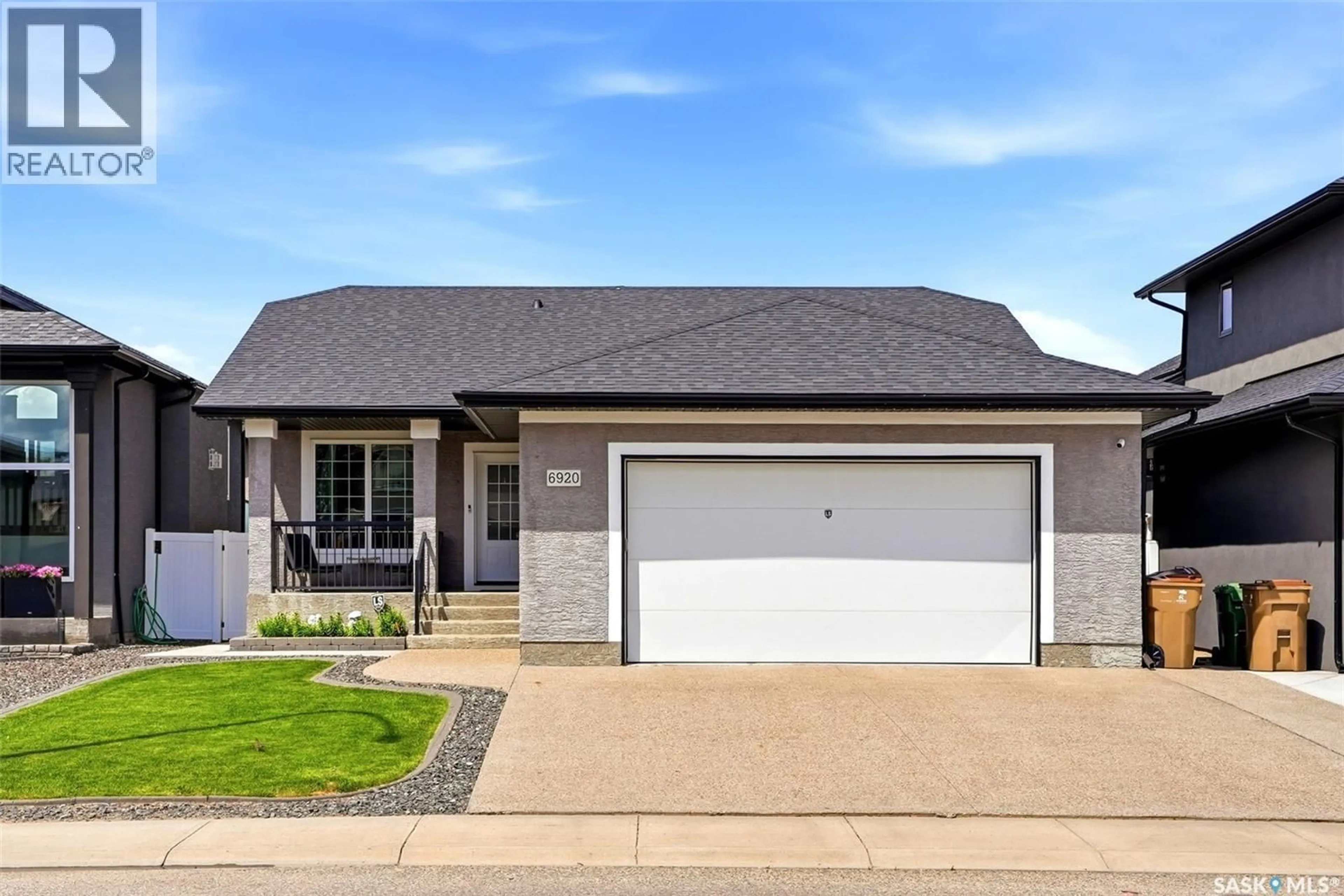 Home with vinyl exterior material, street for 6920 MAPLE RIDGE DRIVE, Regina Saskatchewan S4X0H9