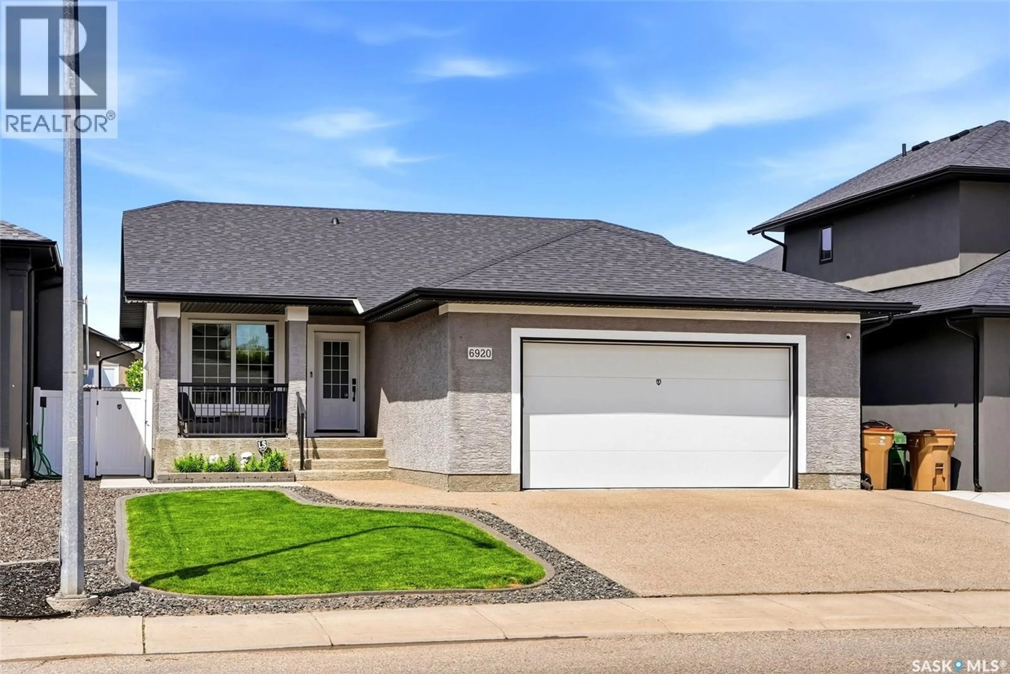 Home with brick exterior material, street for 6920 MAPLE RIDGE DRIVE, Regina Saskatchewan S4X0H9