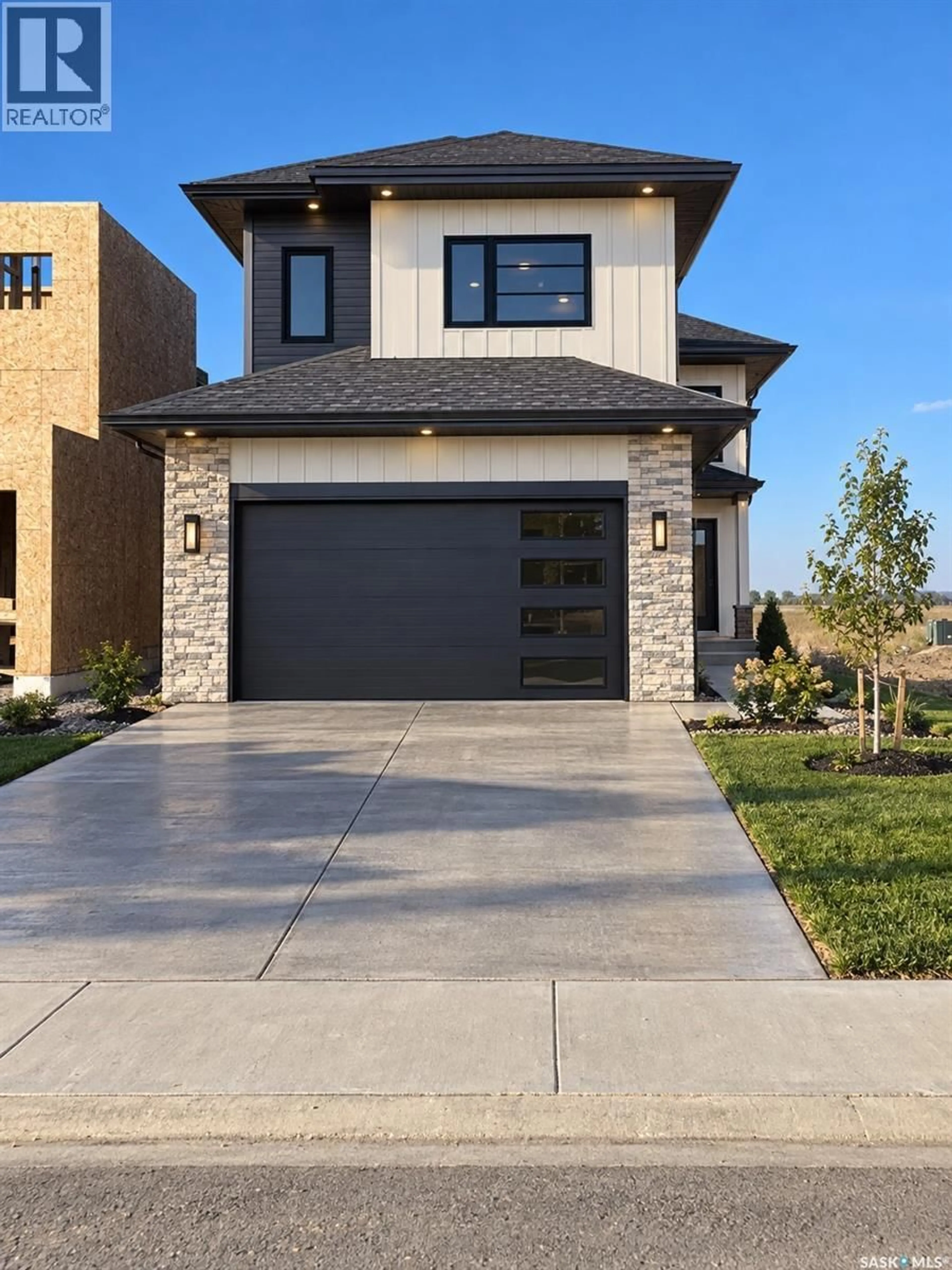 Home with brick exterior material, street for 518 YUEL CRESCENT, Saskatoon Saskatchewan S7W1N7