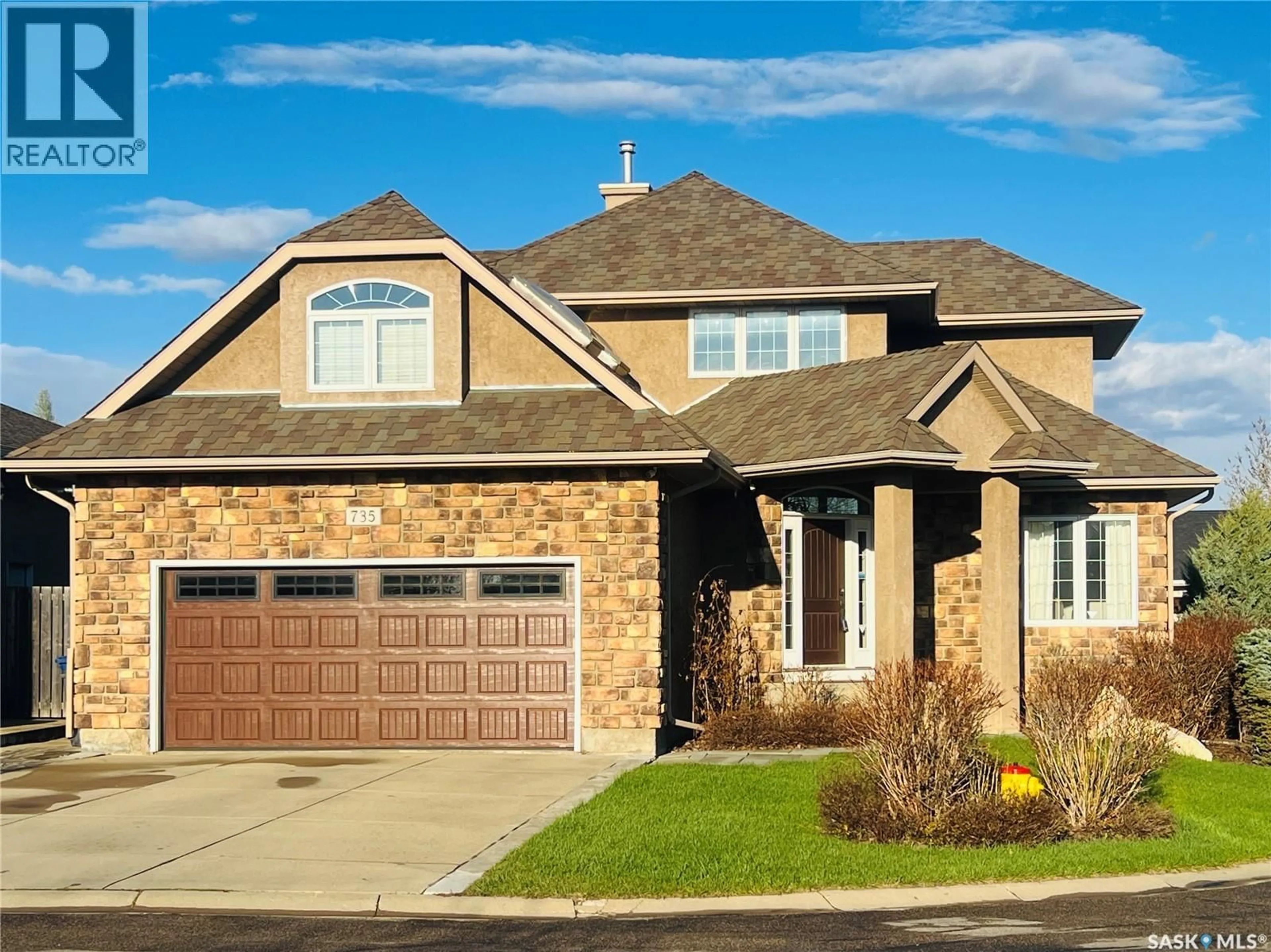 Home with brick exterior material, street for 735 WRIGHT CRESCENT, Saskatoon Saskatchewan S7N4T8