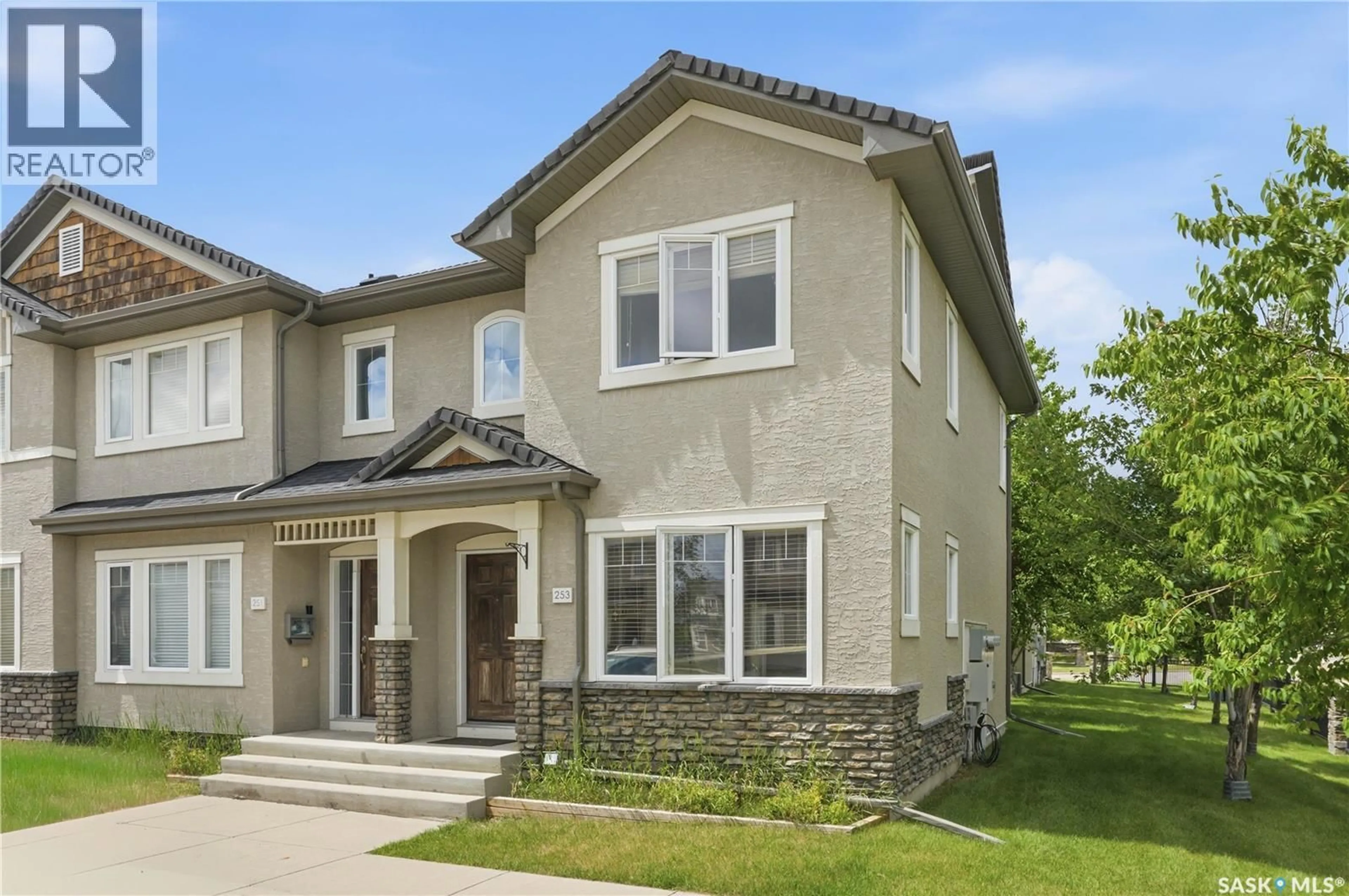 Home with brick exterior material, street for 253 245 ASHWORTH CRESCENT, Saskatoon Saskatchewan S7T0P2