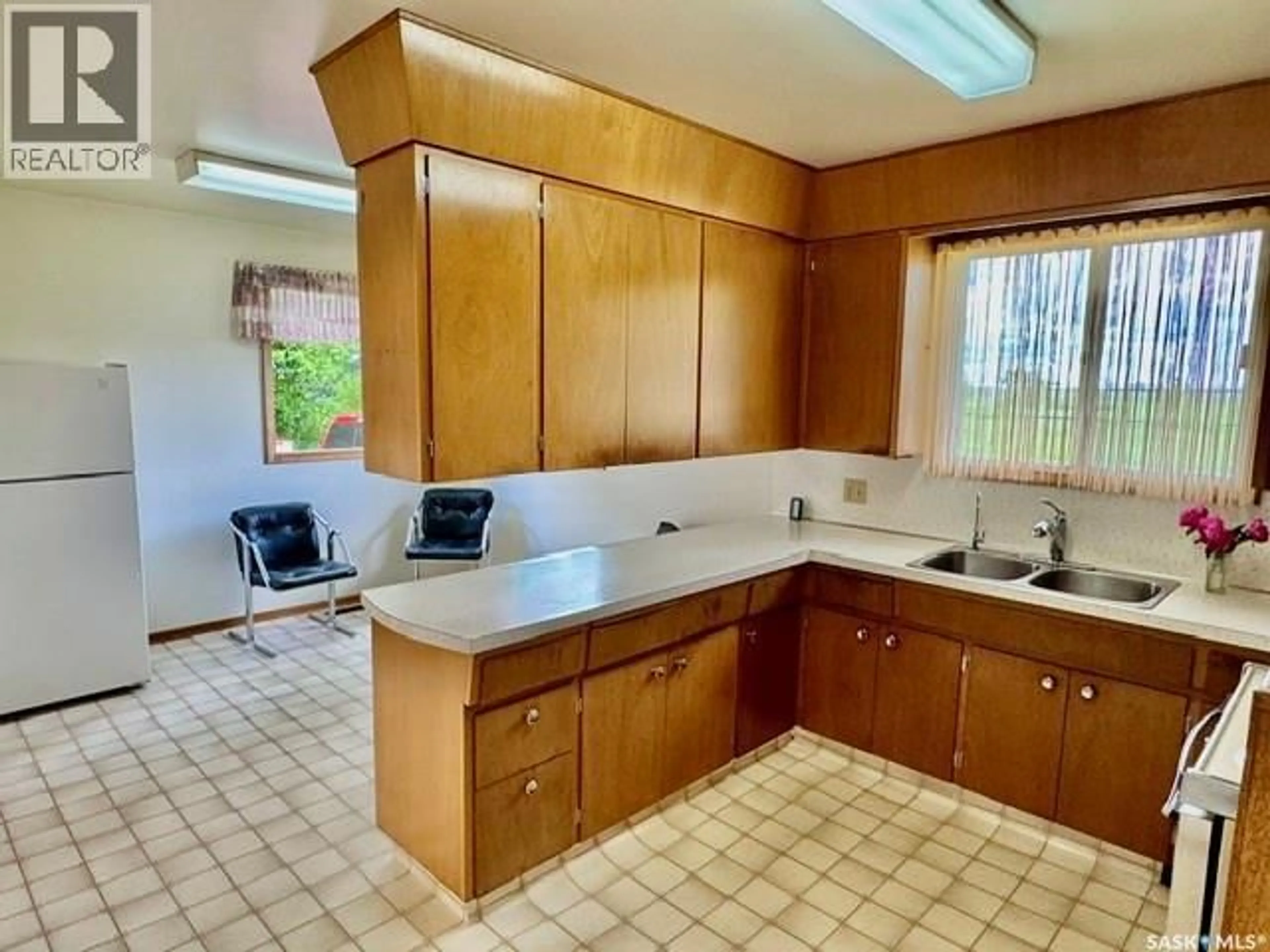 Standard kitchen, ceramic/tile floor for 215 1ST AVENUE, Jansen Saskatchewan S0K2B0