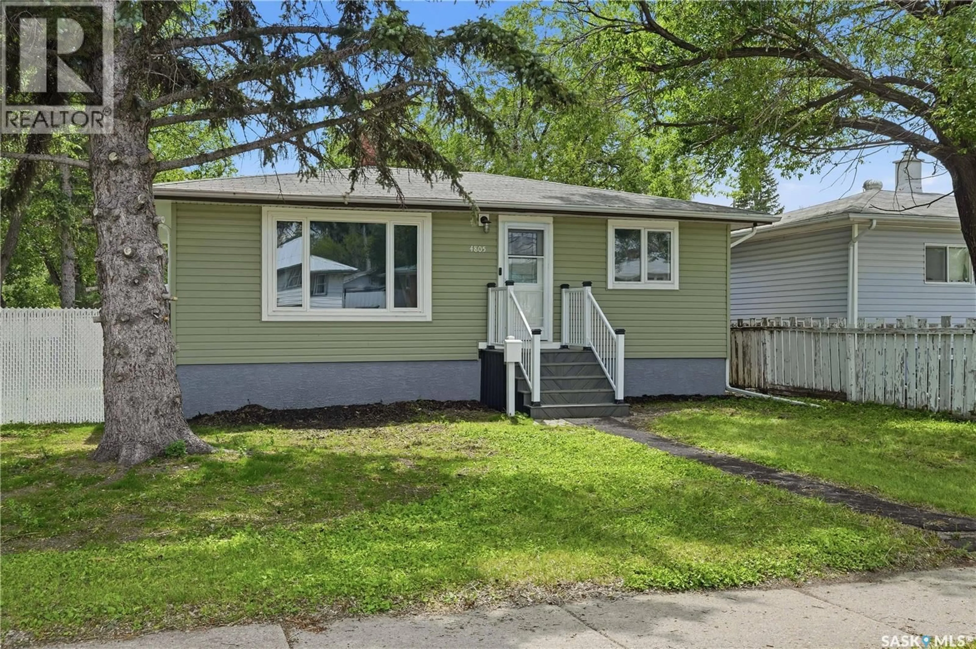 Home with vinyl exterior material, street for 4805 7TH AVENUE, Regina Saskatchewan S4T0R8