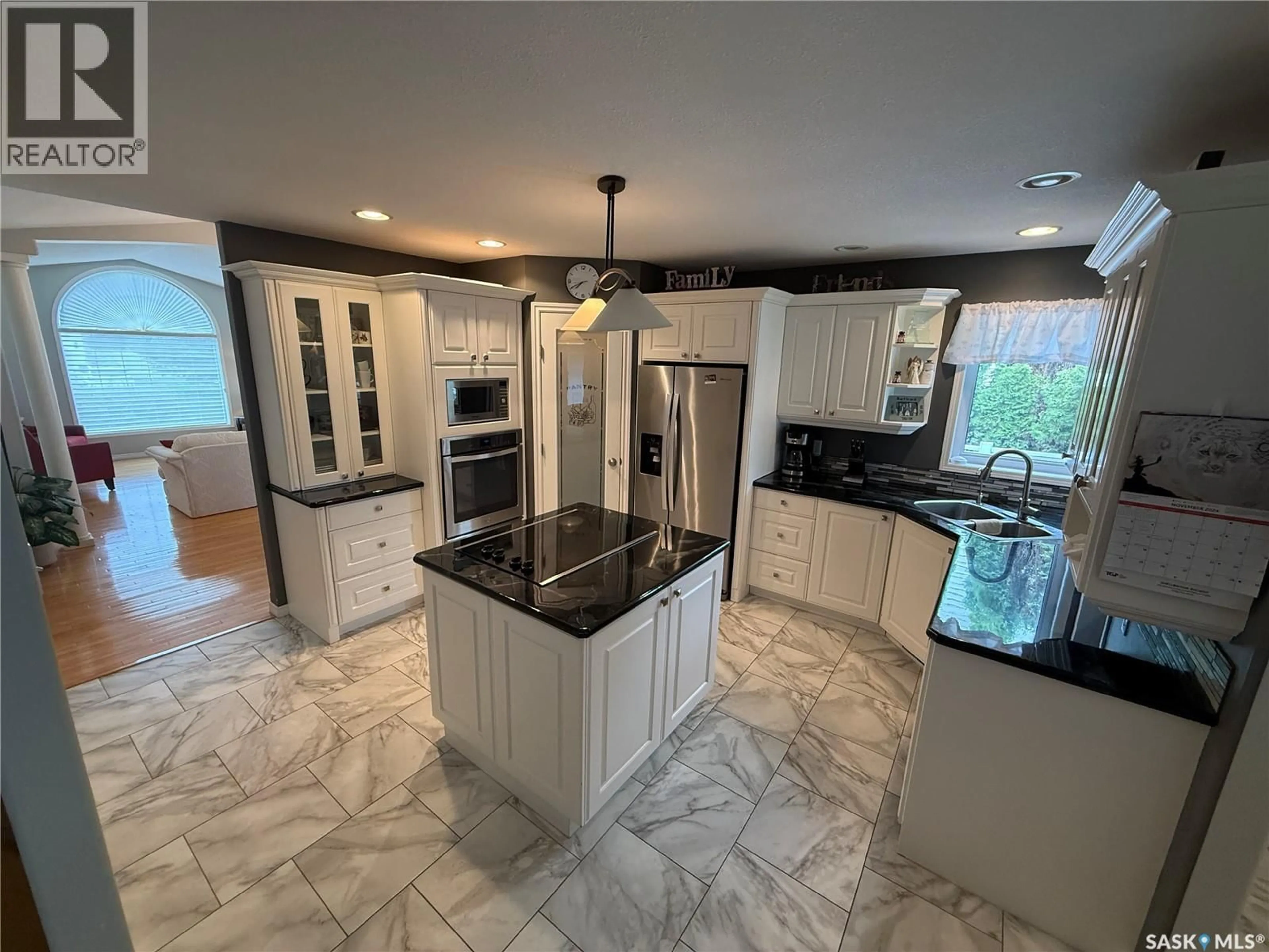Open concept kitchen, ceramic/tile floor for 708 ADAMSON CRESCENT, Shellbrook Saskatchewan S0J2E0