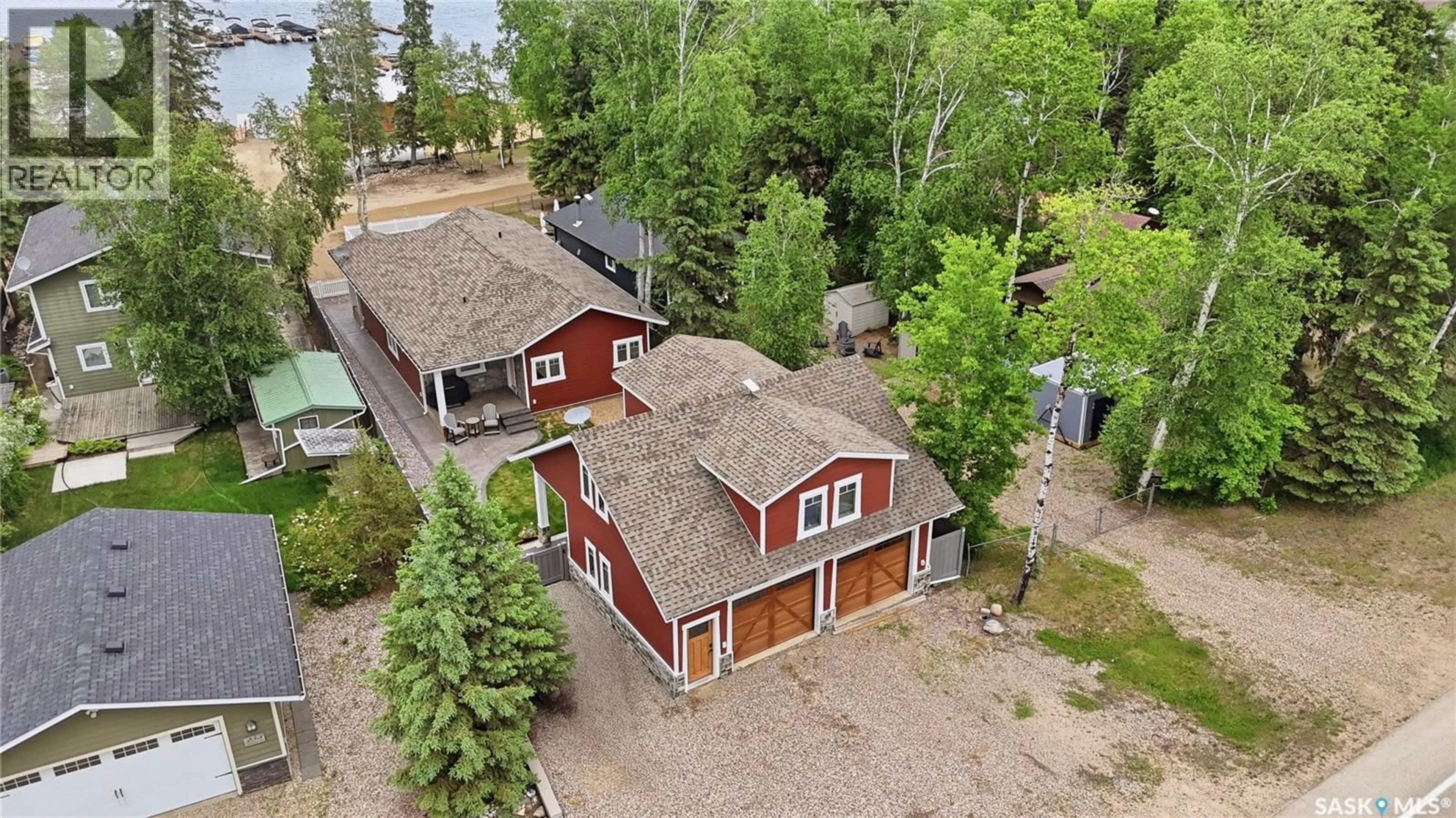 A pic from outside/outdoor area/front of a property/back of a property/a pic from drone, street for 251 LAKESHORE DRIVE, Emma Lake Saskatchewan S0J0N0