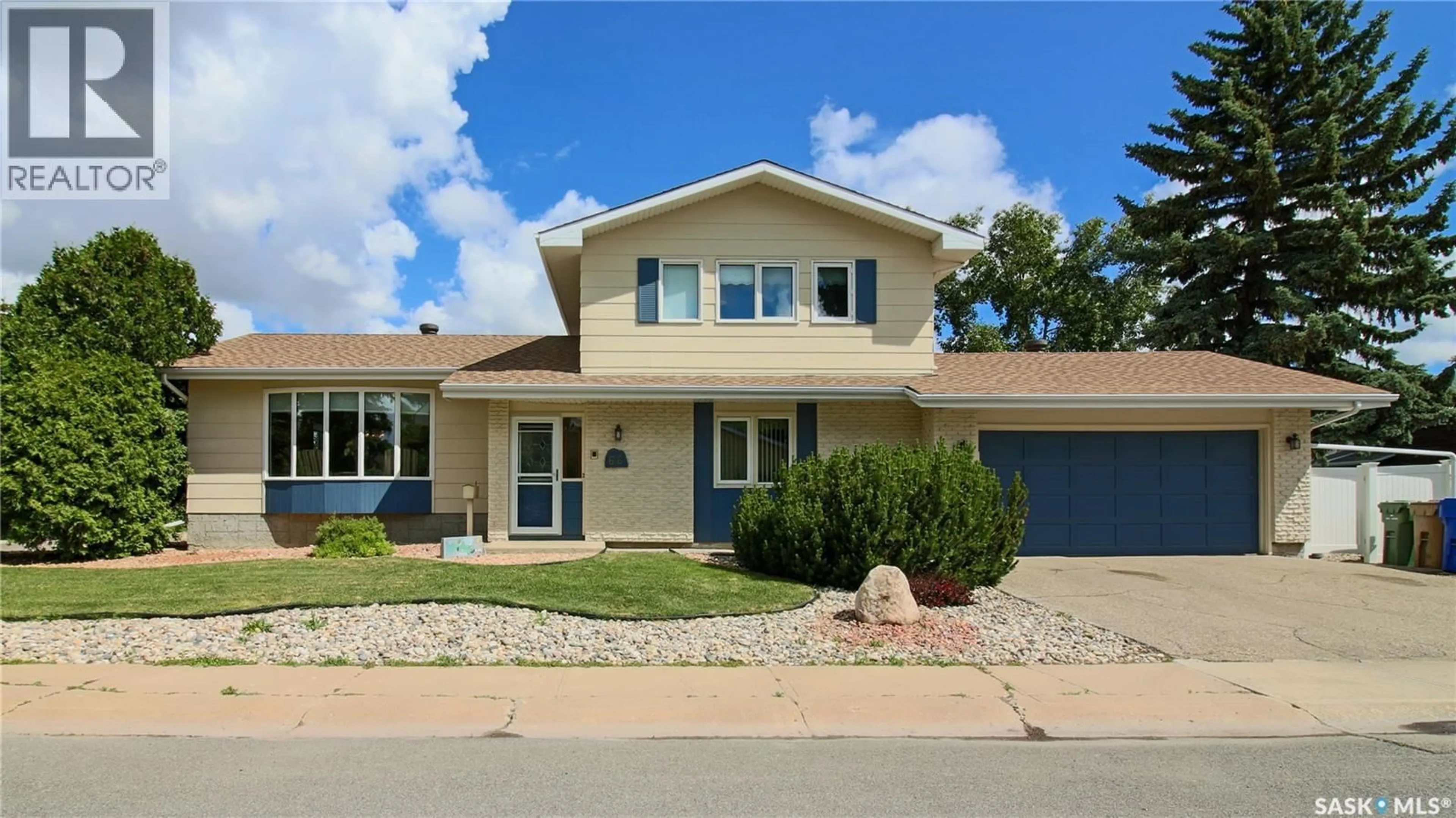 Home with vinyl exterior material, street for 66 SOMMERFELD DRIVE, Regina Saskatchewan S4V0C5