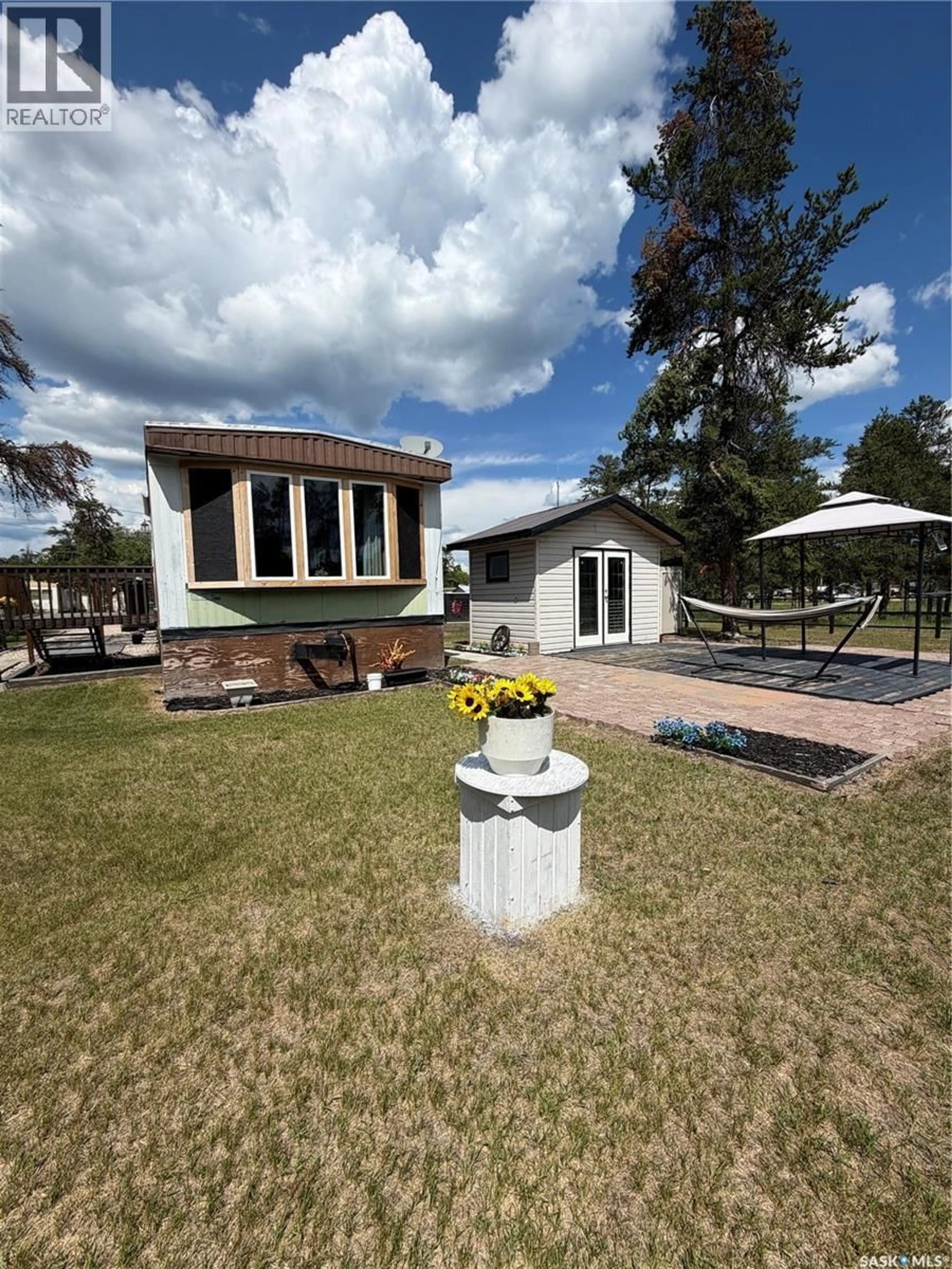 A pic from outside/outdoor area/front of a property/back of a property/a pic from drone, building for 96 STARLITE TRAILER COURT, Hudson Bay Rm No. 394 Saskatchewan S0E0Y0