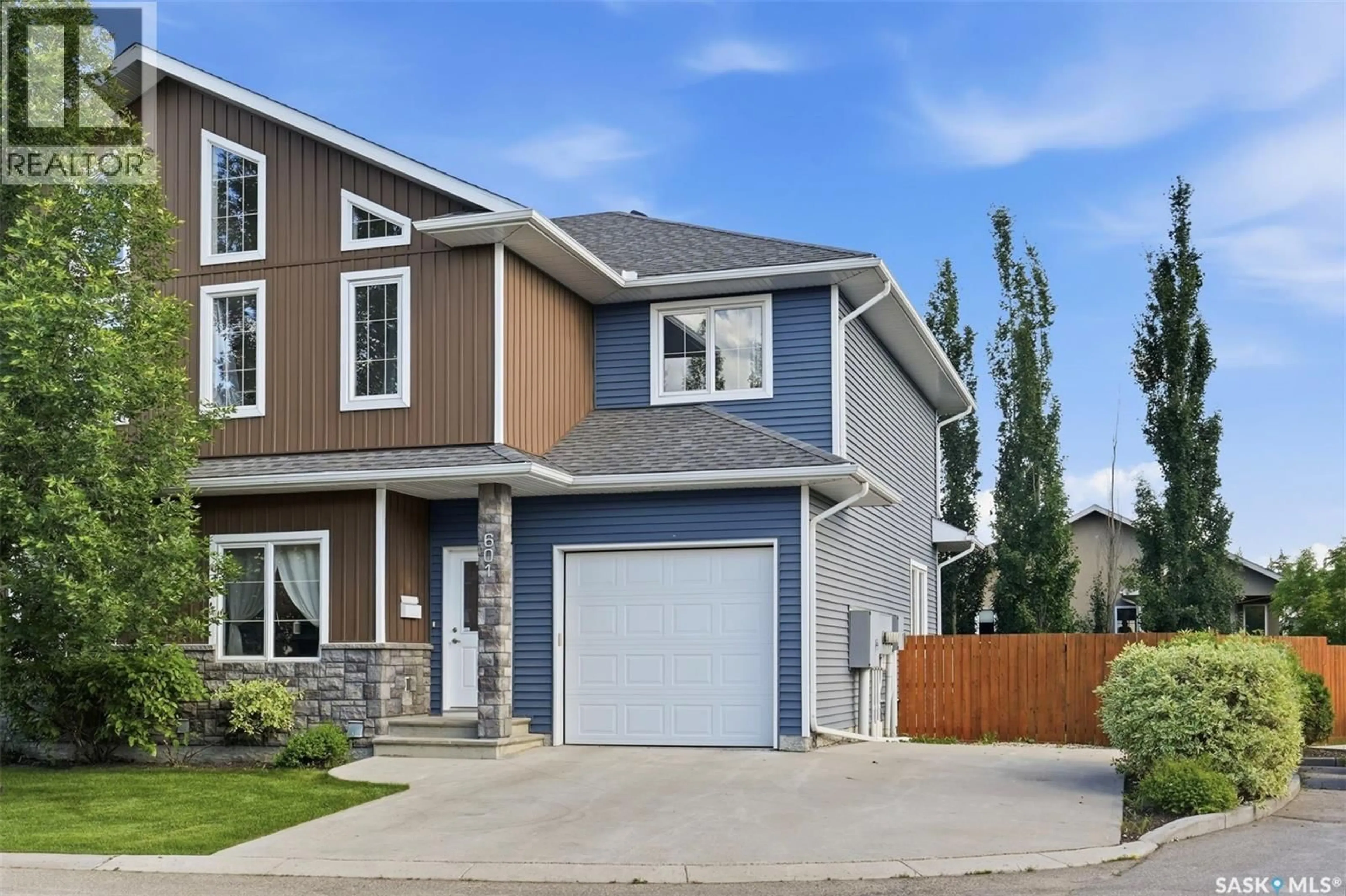 Home with vinyl exterior material, street for 601 315 ZARY ROAD, Saskatoon Saskatchewan S7W0N9
