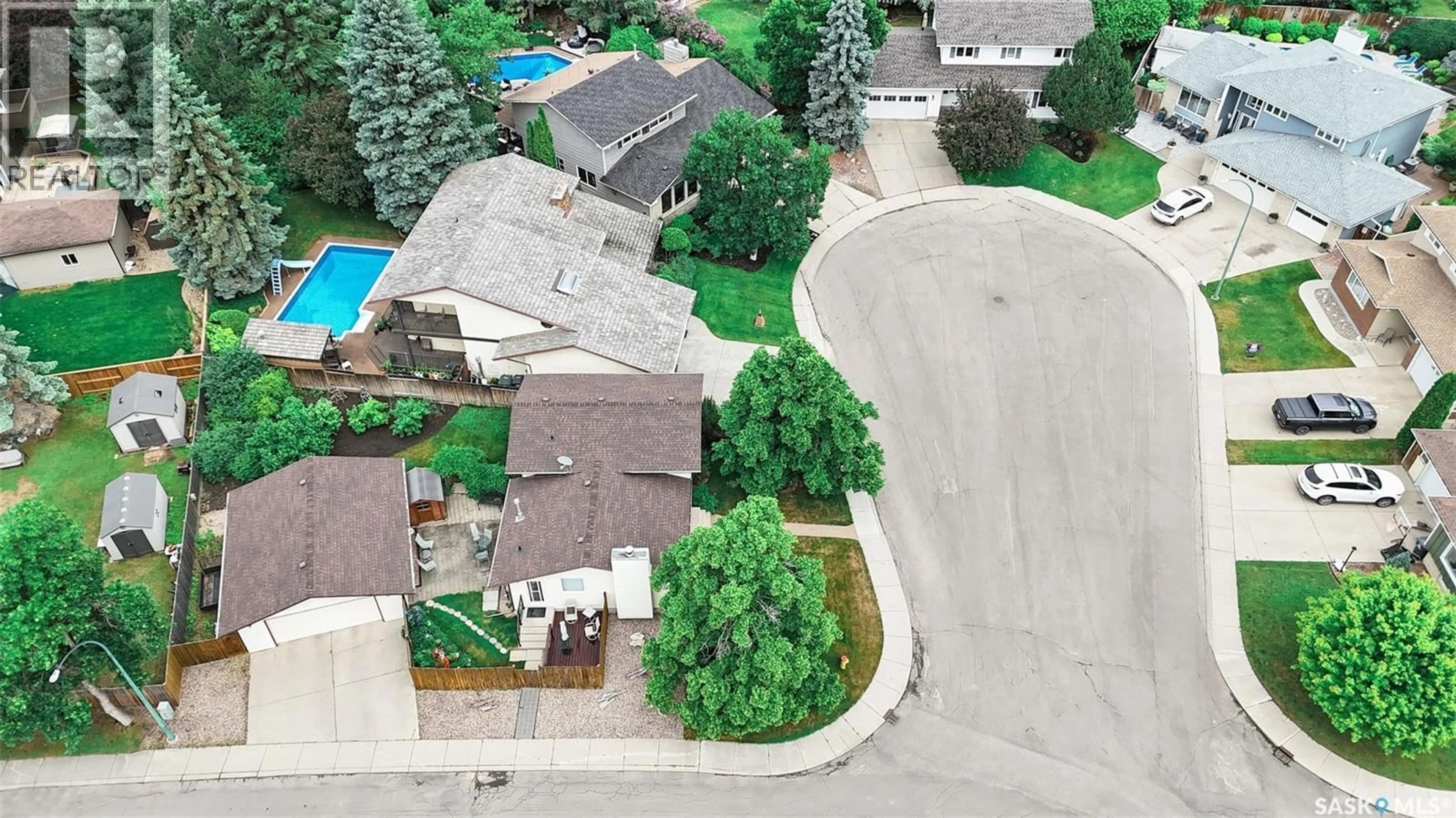 A pic from outside/outdoor area/front of a property/back of a property/a pic from drone, street for 703 CANDLE COURT, Saskatoon Saskatchewan S7K4Z9