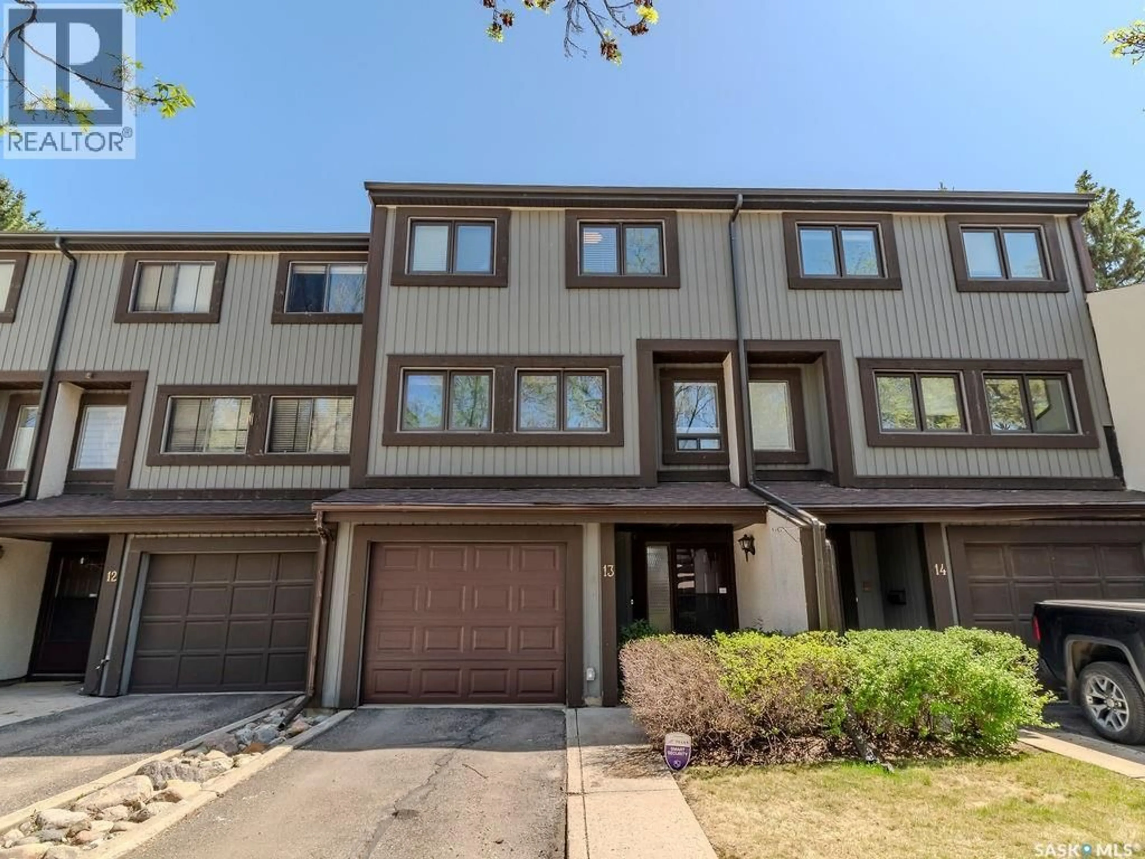 A pic from outside/outdoor area/front of a property/back of a property/a pic from drone, street for 13 455 PINEHOUSE DRIVE, Saskatoon Saskatchewan S7K5X1