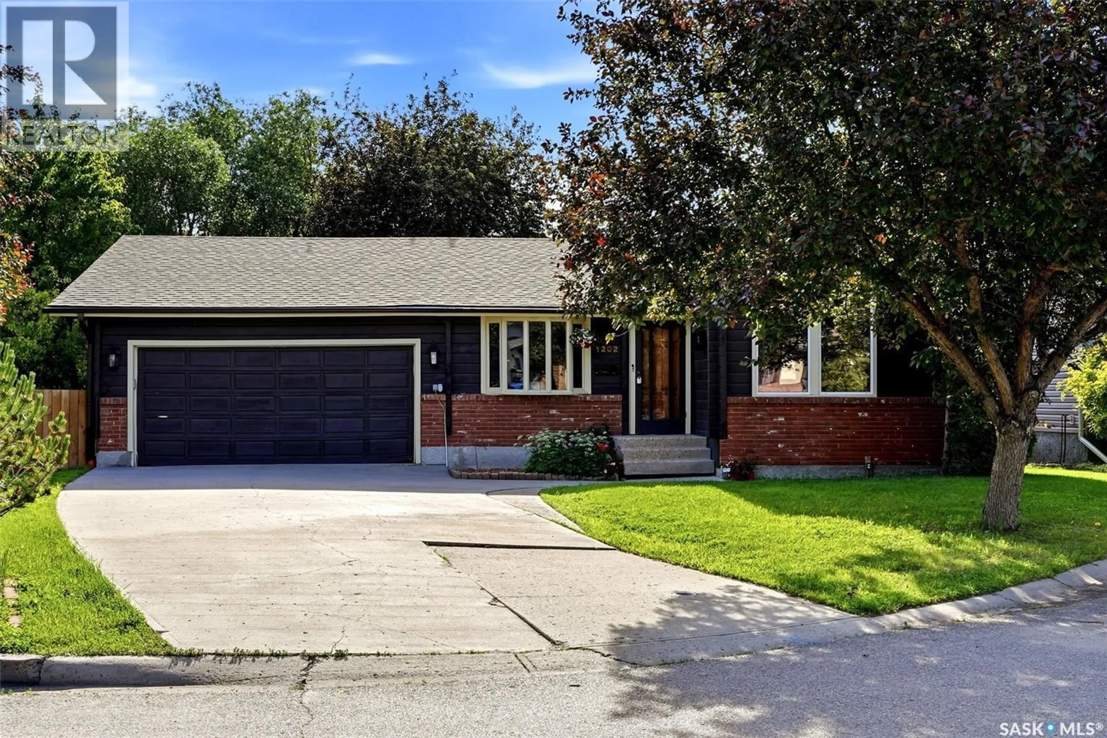 Home with brick exterior material, street for N - 1202 CATLEY BAY, Regina Saskatchewan S4X3A2
