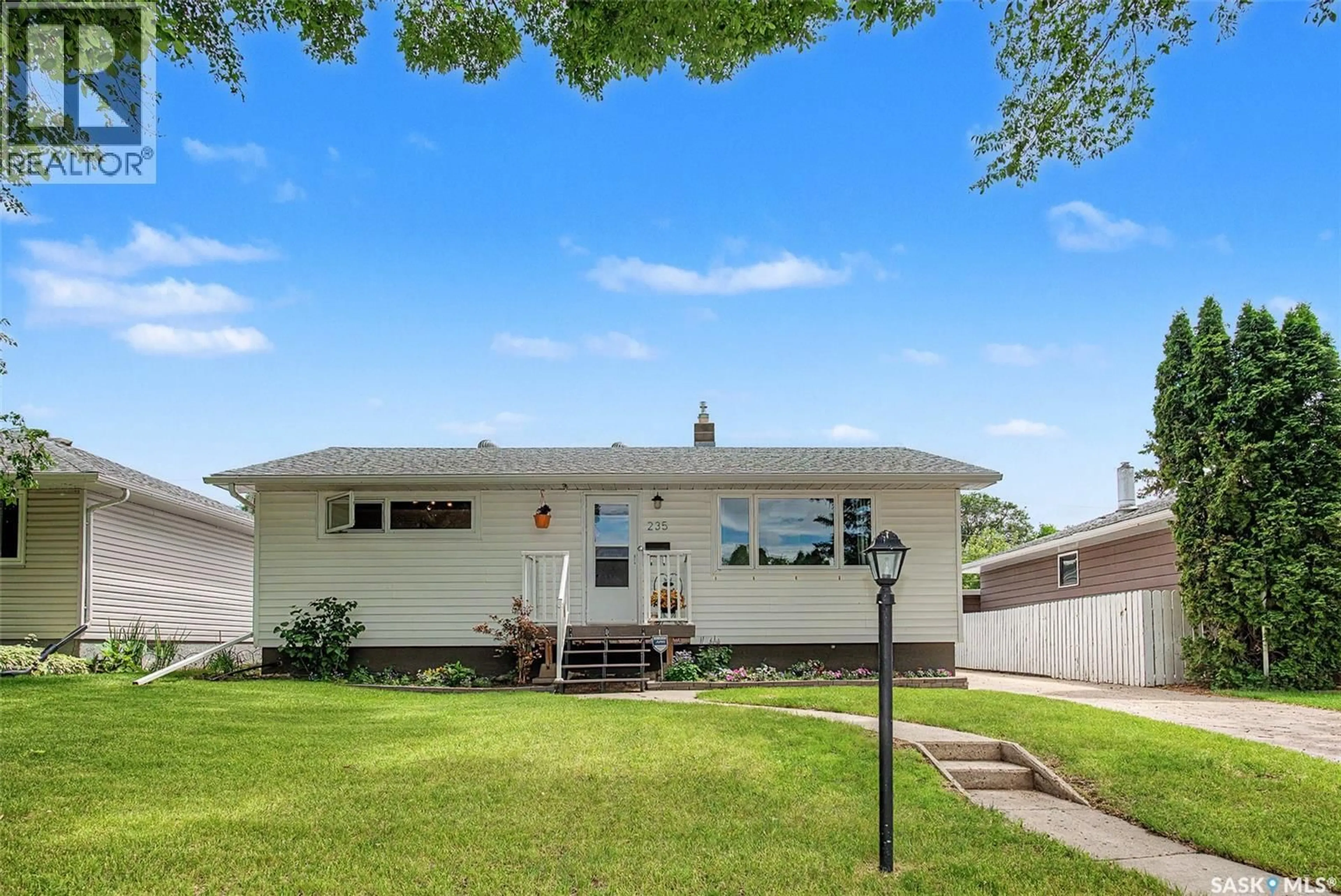 Home with vinyl exterior material, street for 235 TORONTO STREET, Regina Saskatchewan S4R0M3