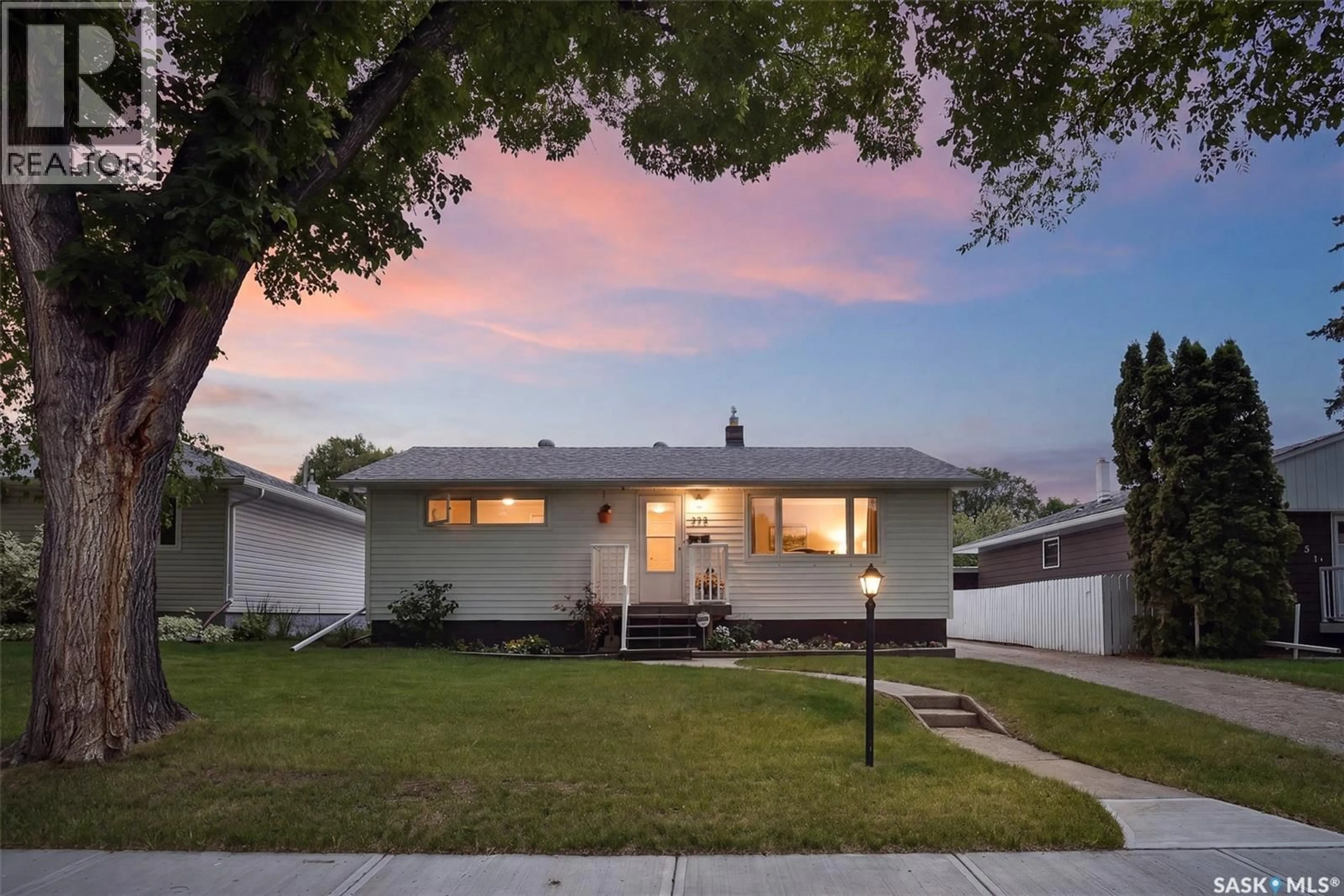 Home with vinyl exterior material, street for 235 TORONTO STREET, Regina Saskatchewan S4R0M3