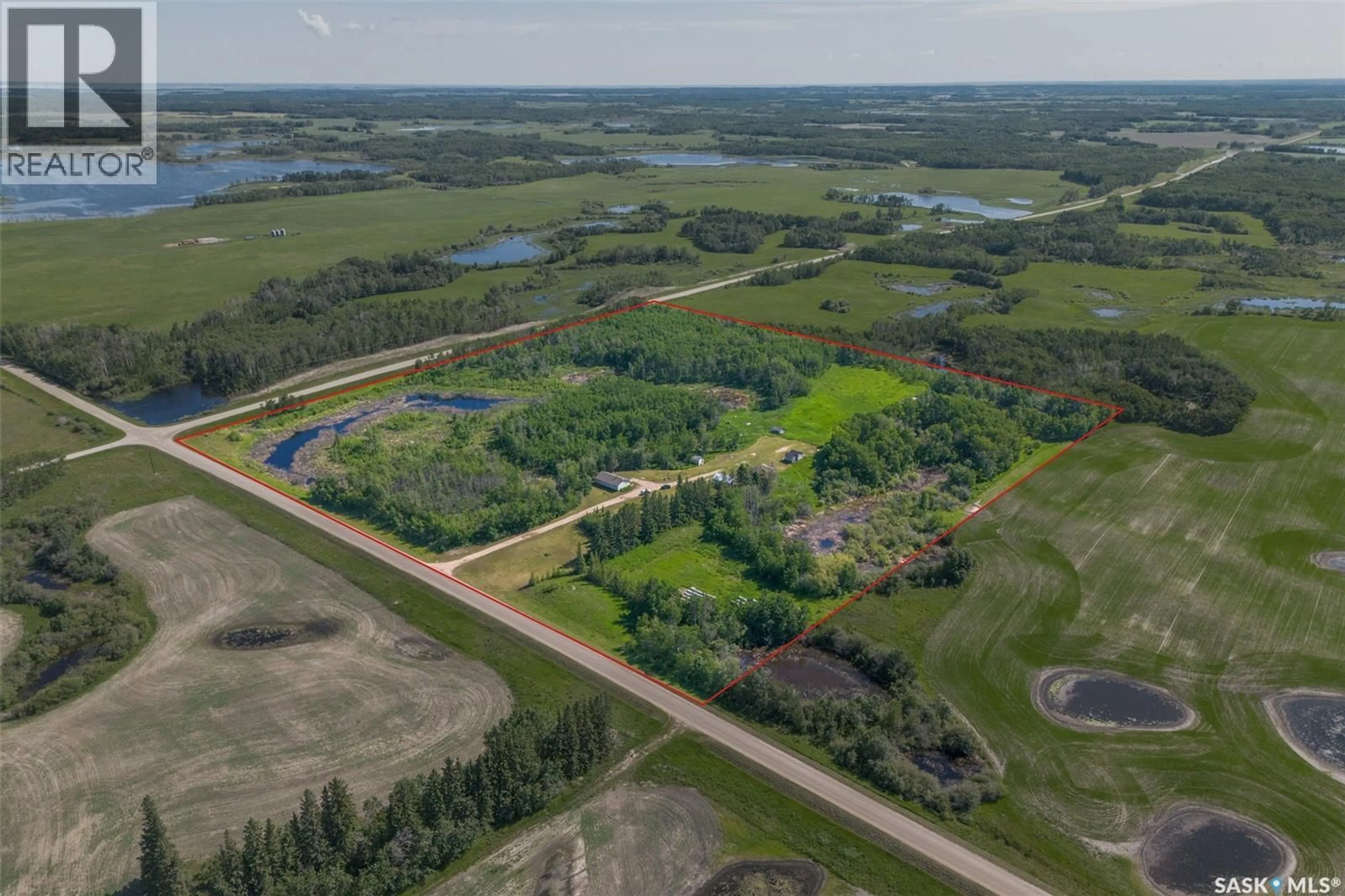 A pic from outside/outdoor area/front of a property/back of a property/a pic from drone, water/lake/river/ocean view for CHABOT ACREAGE, Three Lakes Rm No. 400 Saskatchewan S0K3V0