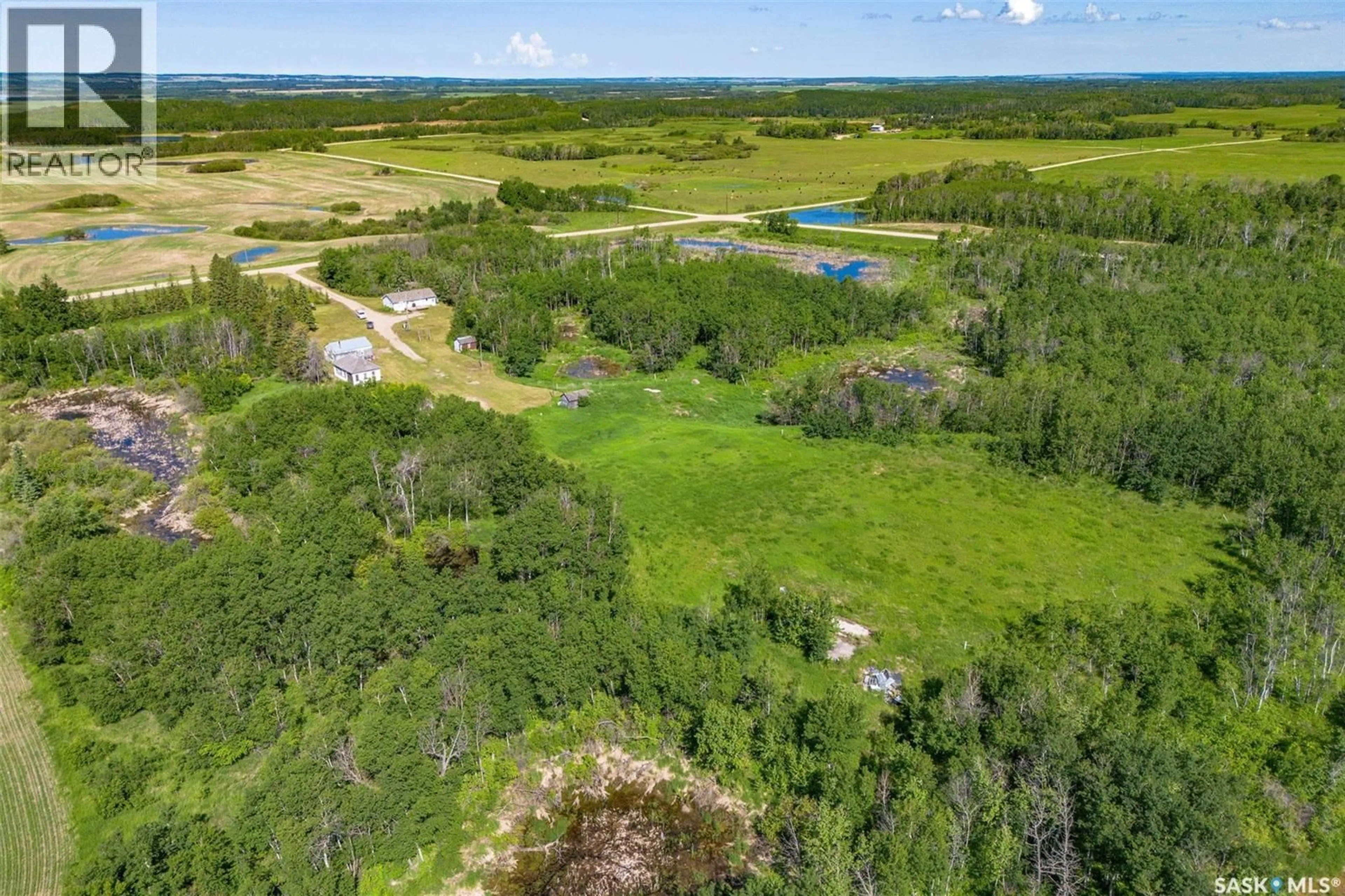 A pic from outside/outdoor area/front of a property/back of a property/a pic from drone, water/lake/river/ocean view for CHABOT ACREAGE, Three Lakes Rm No. 400 Saskatchewan S0K3V0
