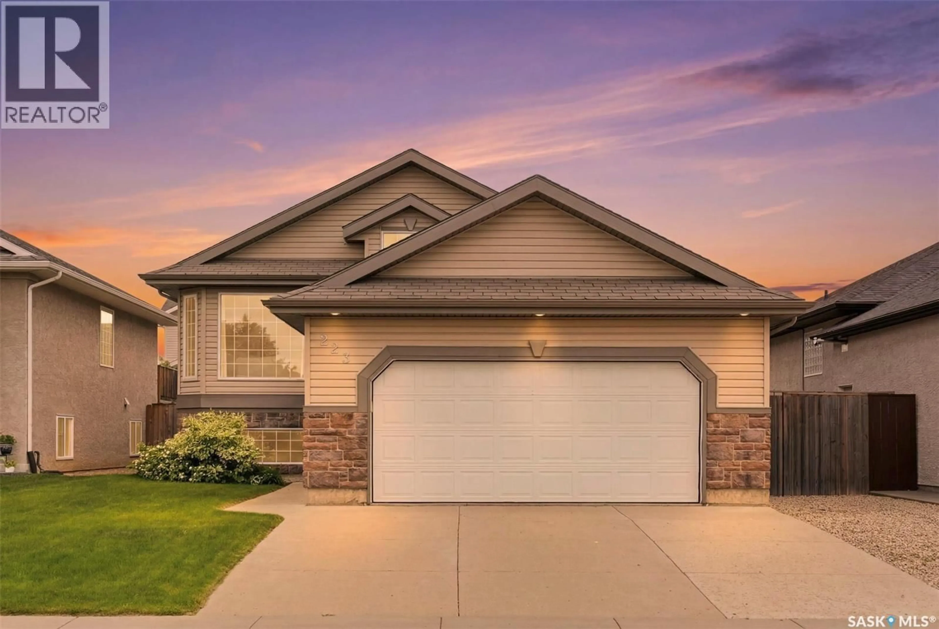 Home with brick exterior material, street for 223 TRIMBLE LANE, Saskatoon Saskatchewan S7W0C9