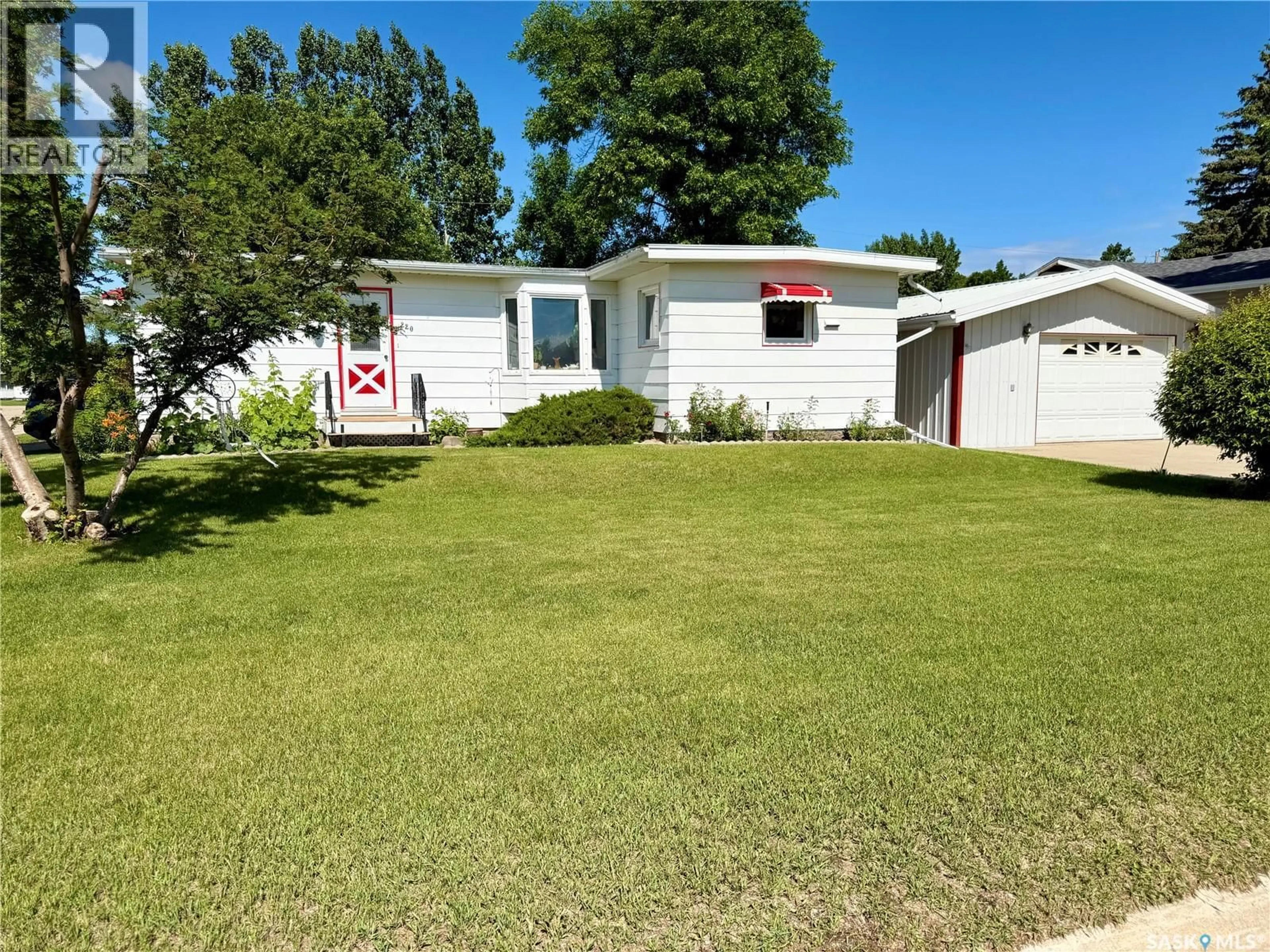 Home with vinyl exterior material, street for 220 2ND STREET, Carnduff Saskatchewan S0C0S0