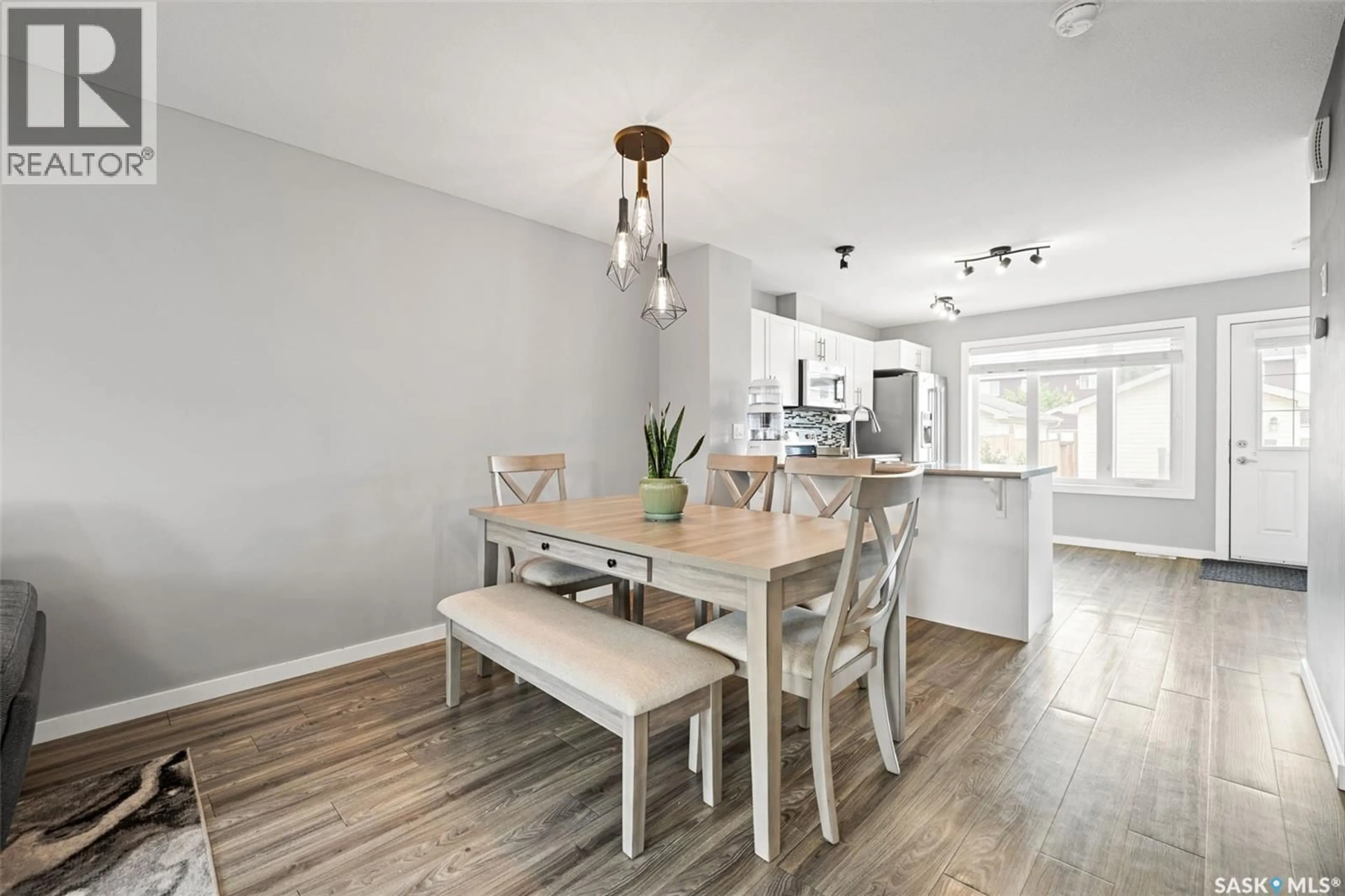 Dining room, wood/laminate floor for 3499 GREEN LAVENDER DRIVE, Regina Saskatchewan S4V3M6