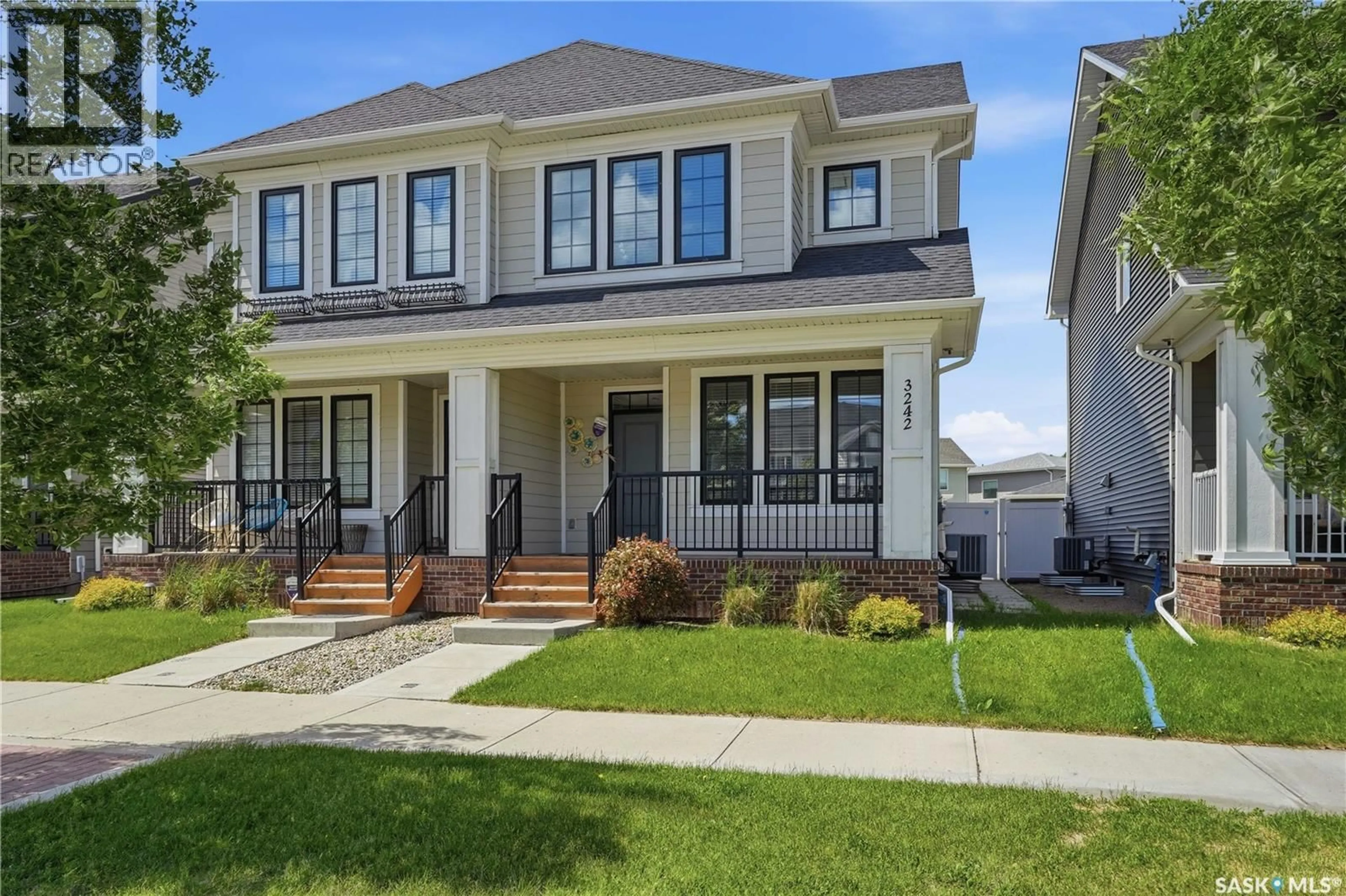 Home with vinyl exterior material, street for 3242 CHUKA BOULEVARD, Regina Saskatchewan S4V3S6