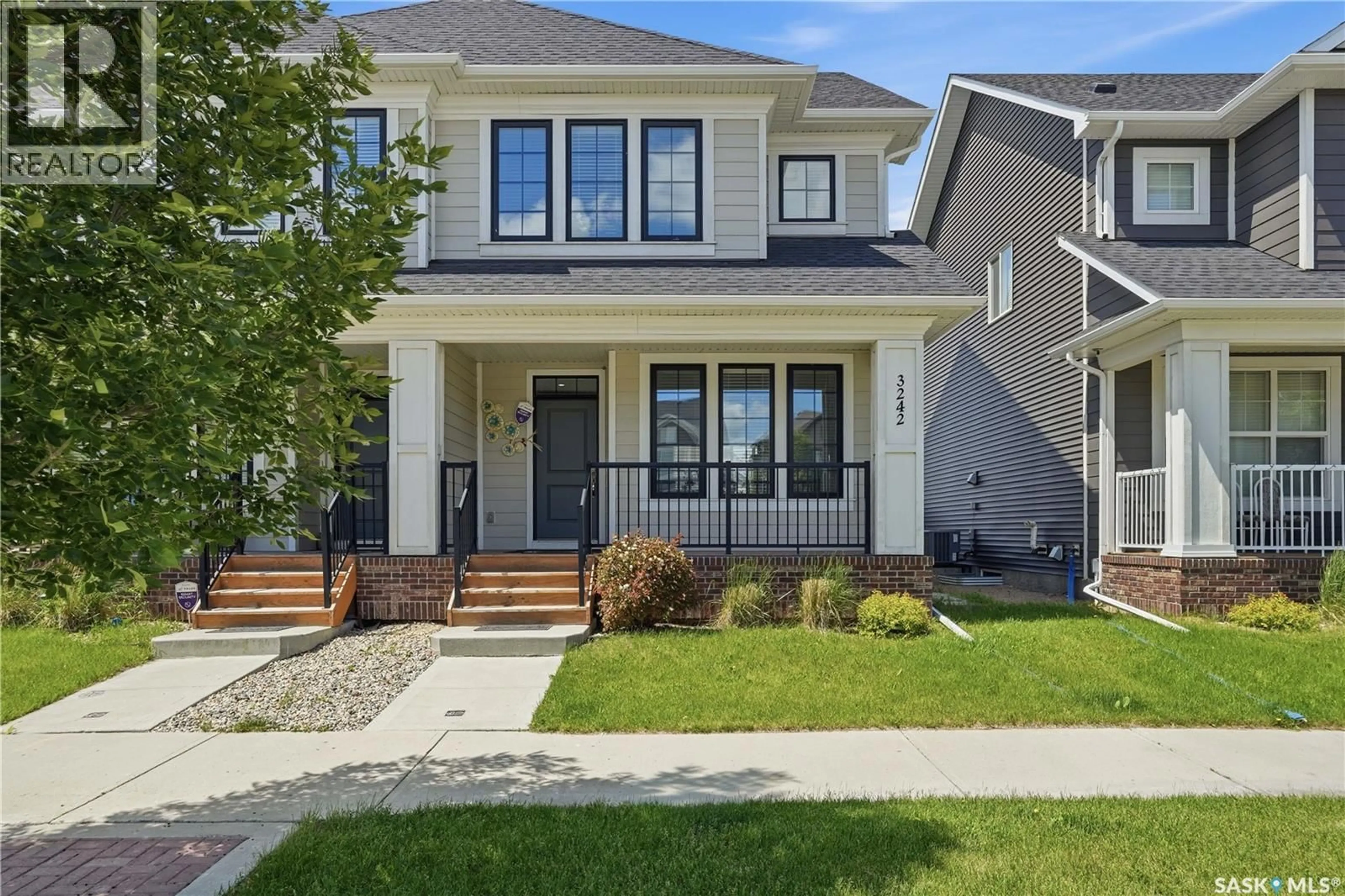 Home with vinyl exterior material, street for 3242 CHUKA BOULEVARD, Regina Saskatchewan S4V3S6