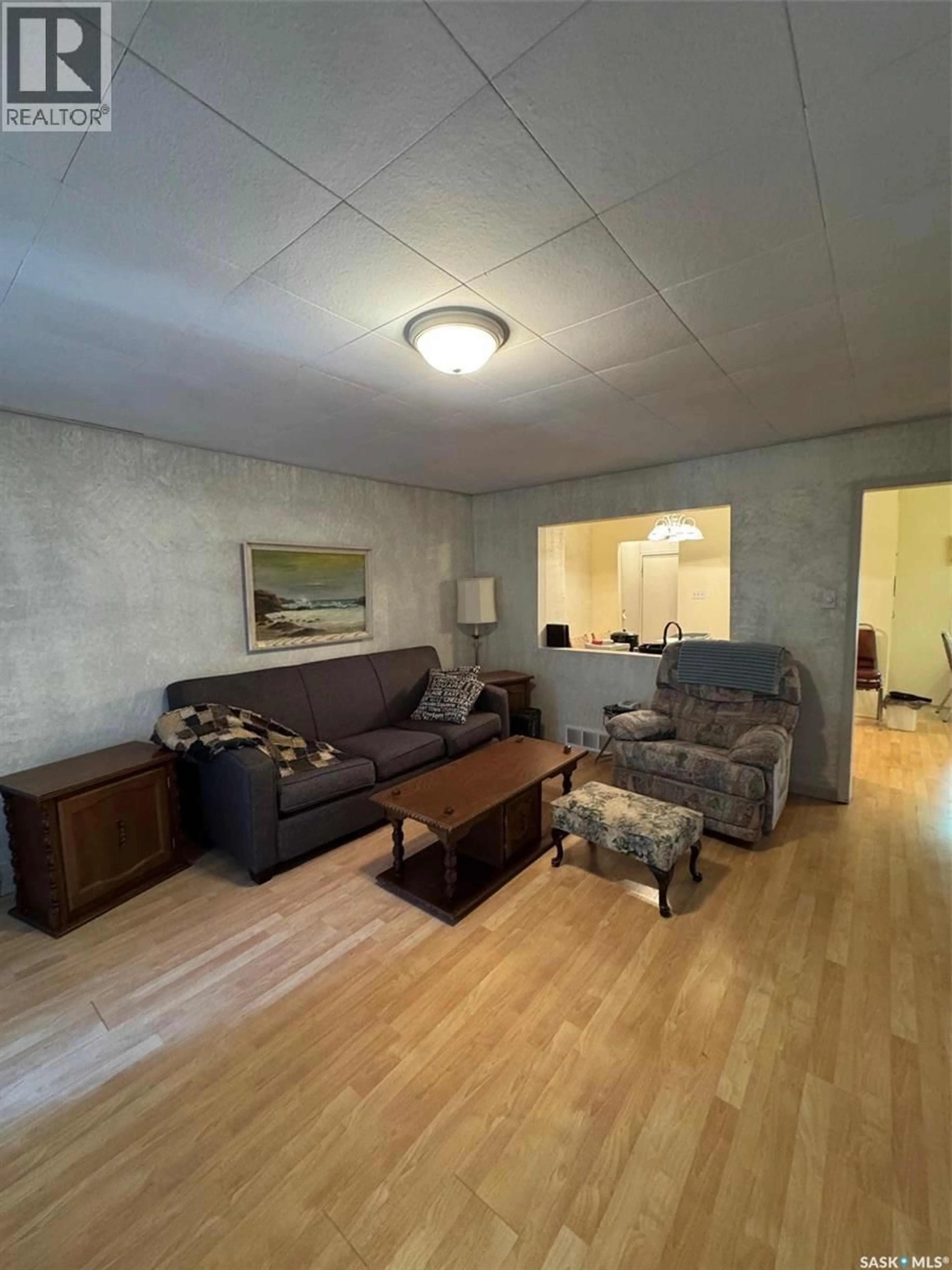 Living room with furniture, unknown for 1351 108TH STREET, North Battleford Saskatchewan S9A2B6