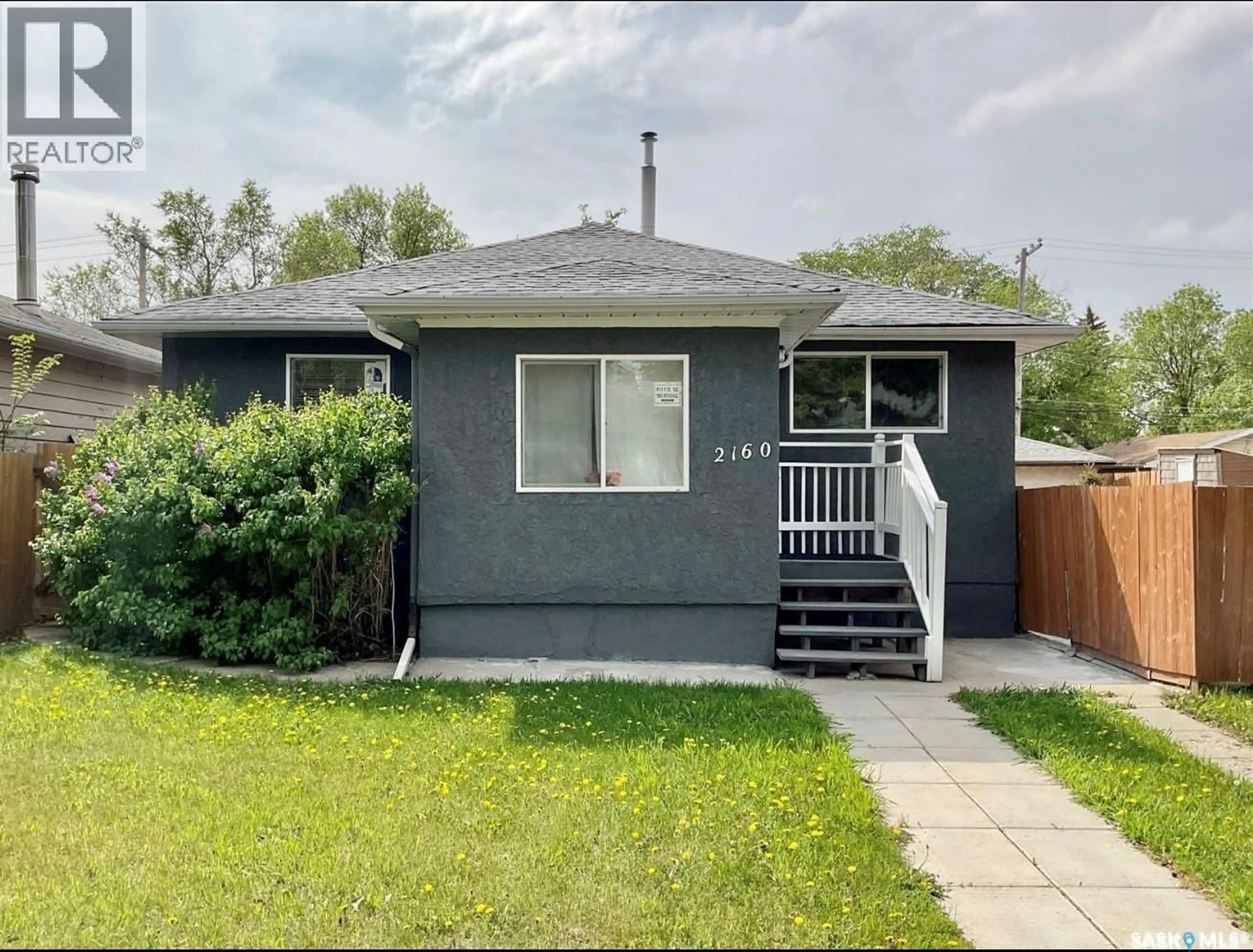 Home with vinyl exterior material, street for 2160 BORDEN STREET, Regina Saskatchewan S4N2K8