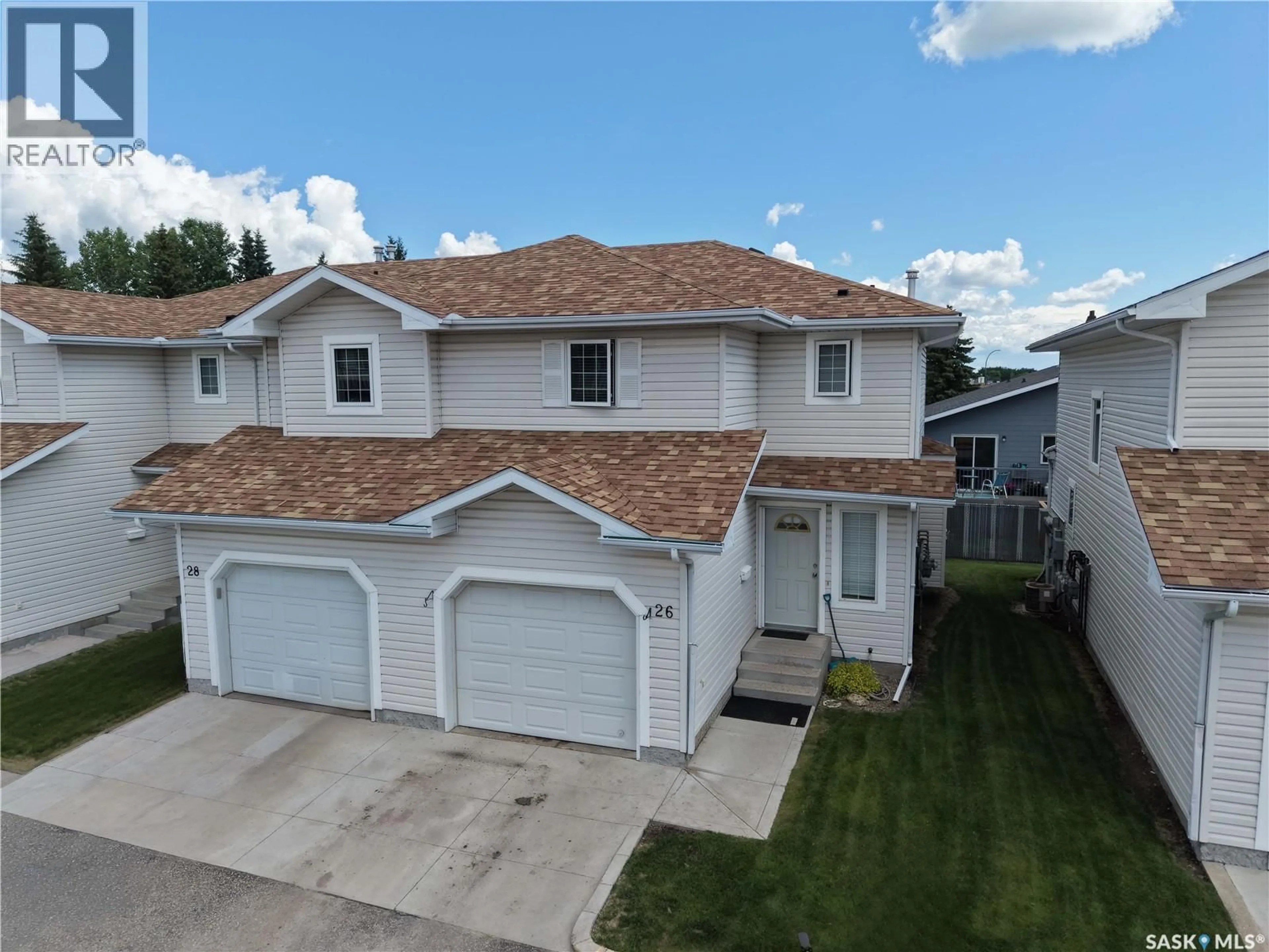 A pic from outside/outdoor area/front of a property/back of a property/a pic from drone, street for 1620 - 26 OLIVE DIEFENBAKER DRIVE, Prince Albert Saskatchewan S6X1C5