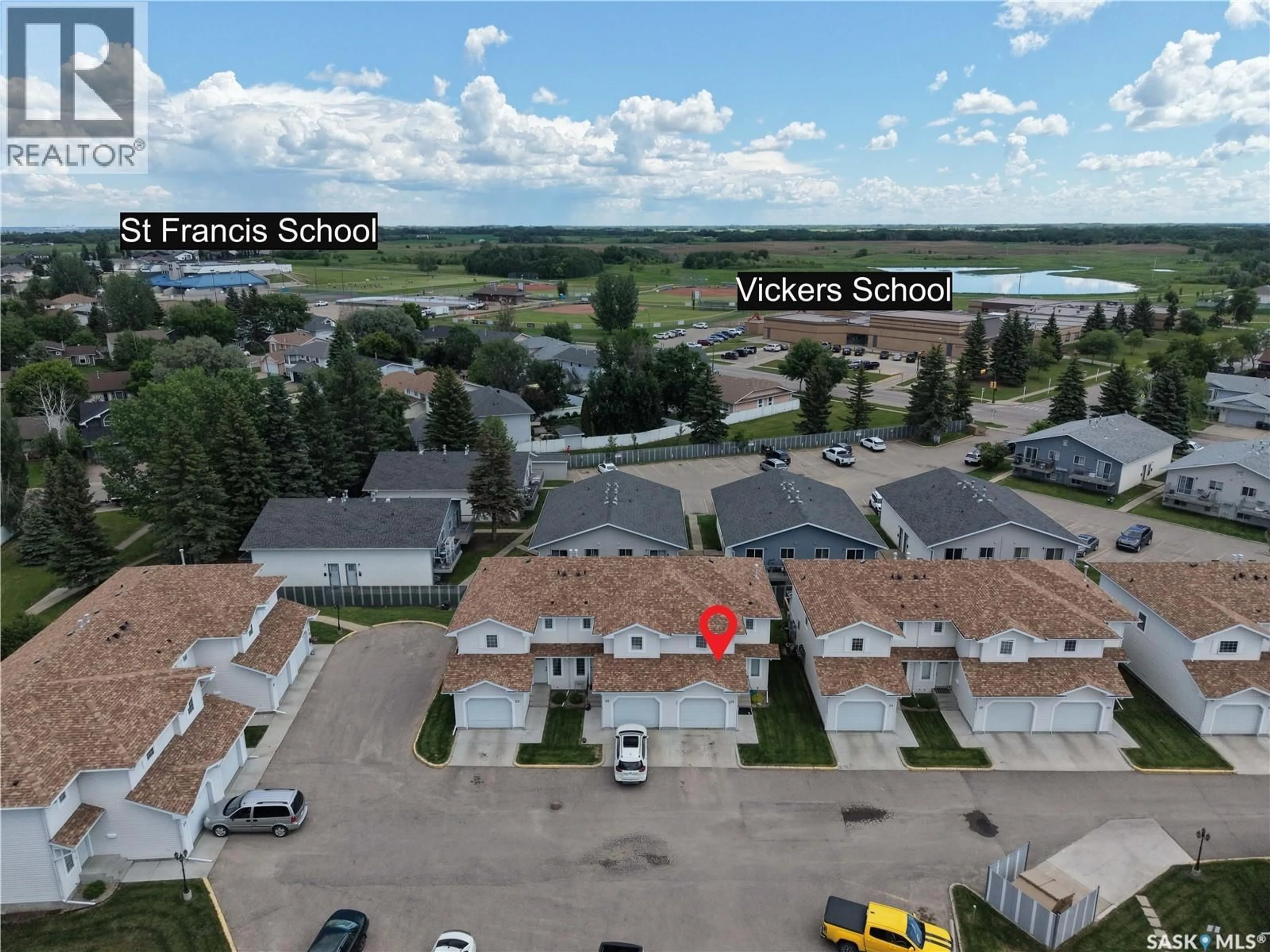 A pic from outside/outdoor area/front of a property/back of a property/a pic from drone, street for 1620 - 26 OLIVE DIEFENBAKER DRIVE, Prince Albert Saskatchewan S6X1C5