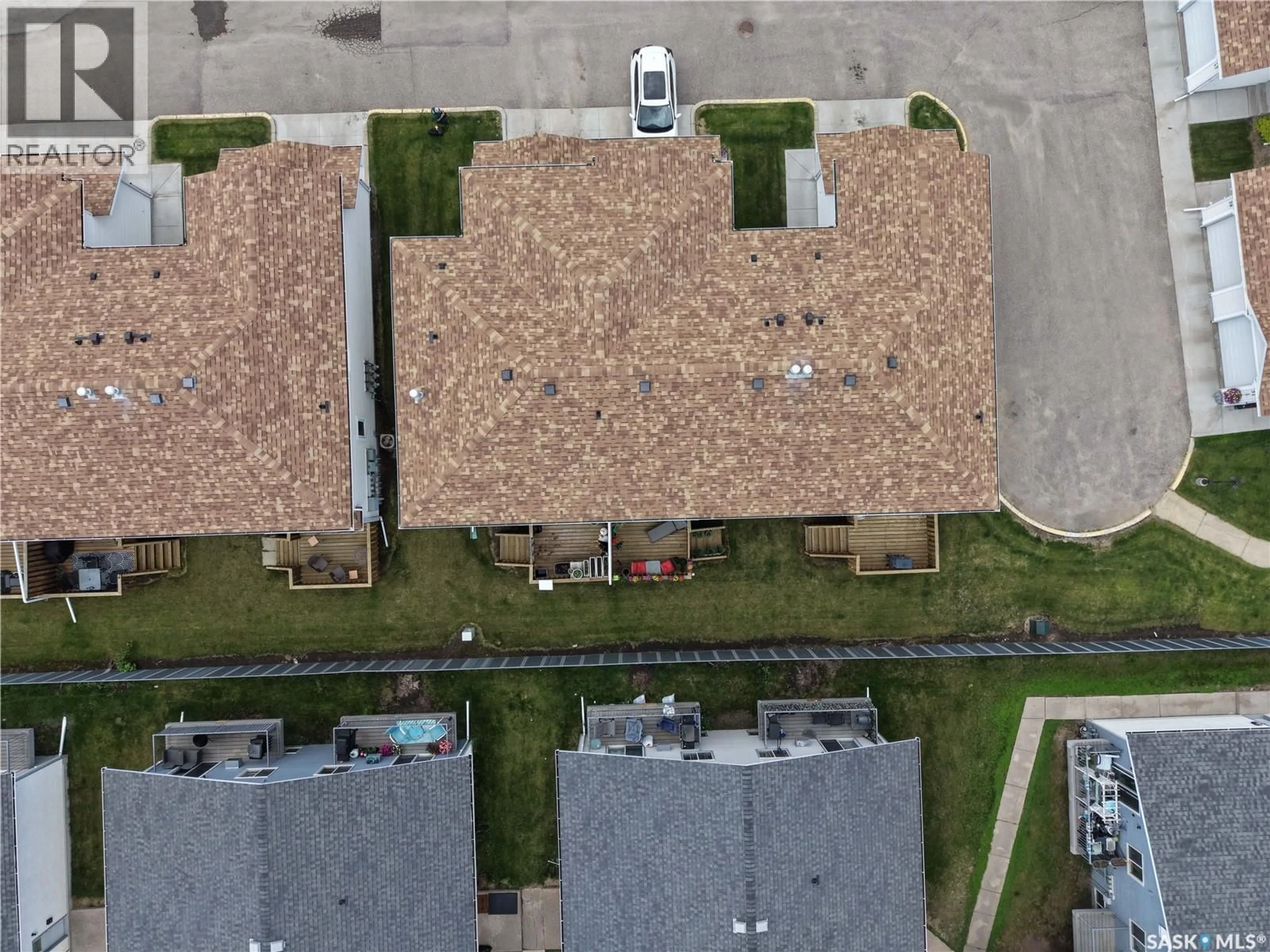 A pic from outside/outdoor area/front of a property/back of a property/a pic from drone, street for 1620 - 26 OLIVE DIEFENBAKER DRIVE, Prince Albert Saskatchewan S6X1C5