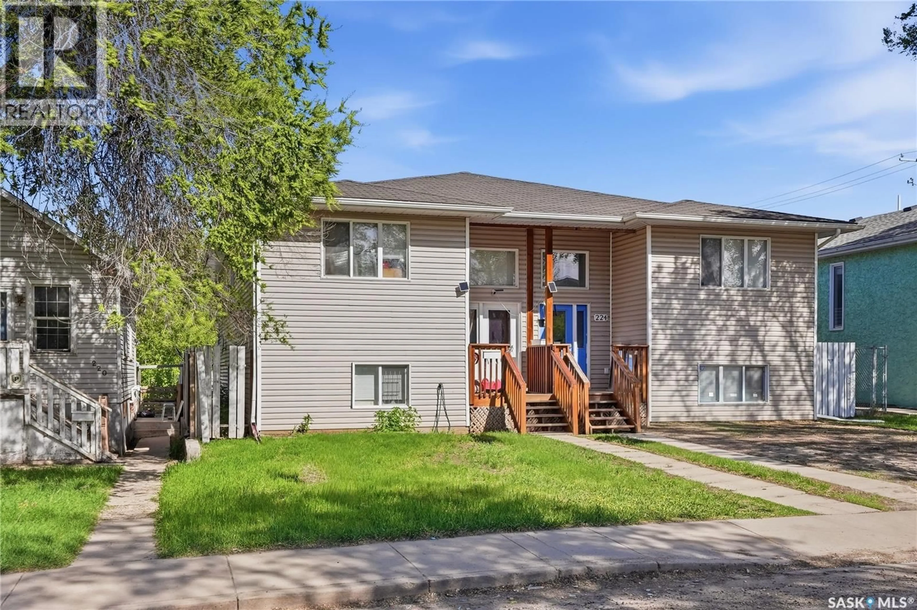 Home with vinyl exterior material, street for 222 V AVENUE, Saskatoon Saskatchewan S7M3B3