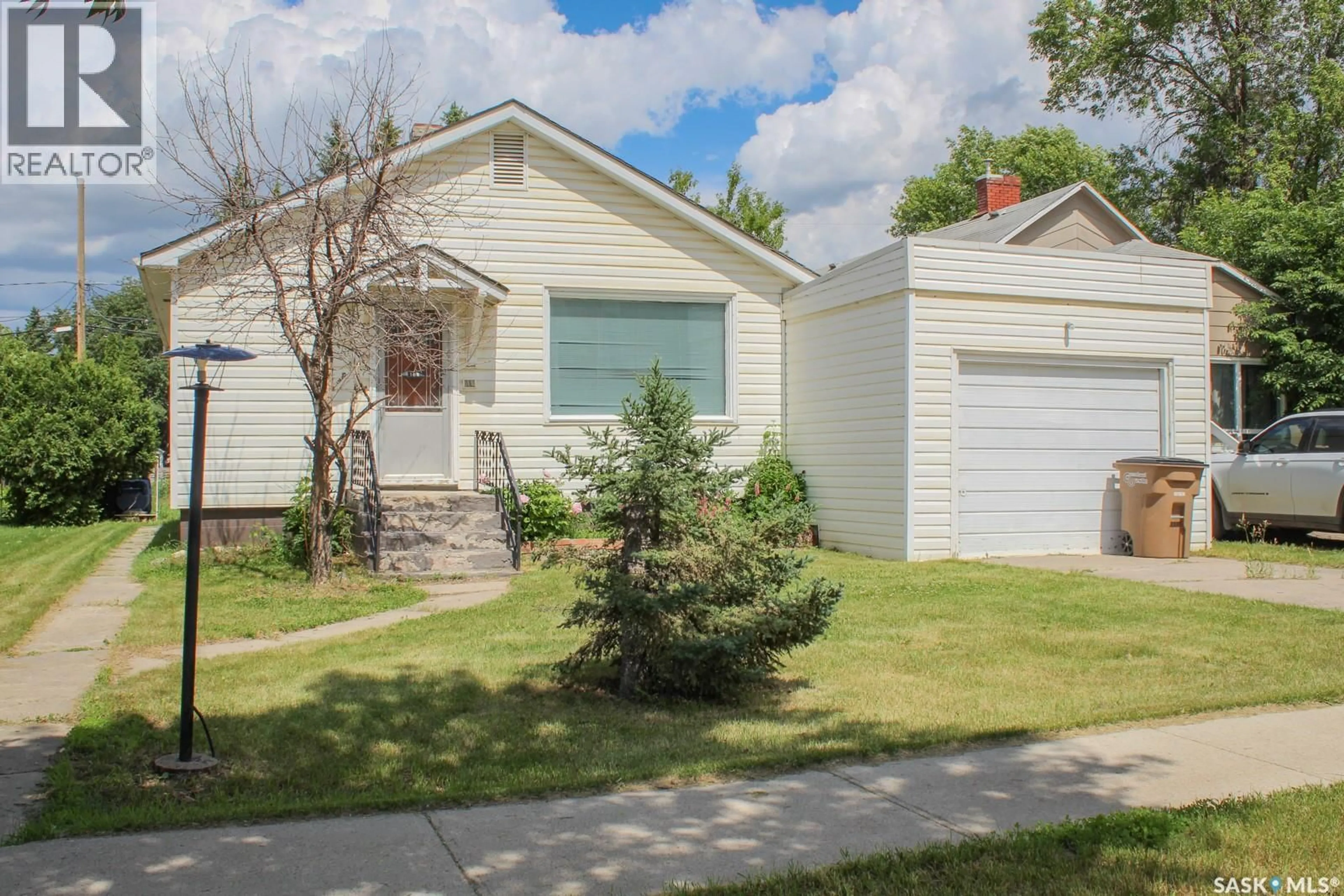 Home with vinyl exterior material, street for E - 108 CRAWFORD AVENUE, Melfort Saskatchewan S0E1A0