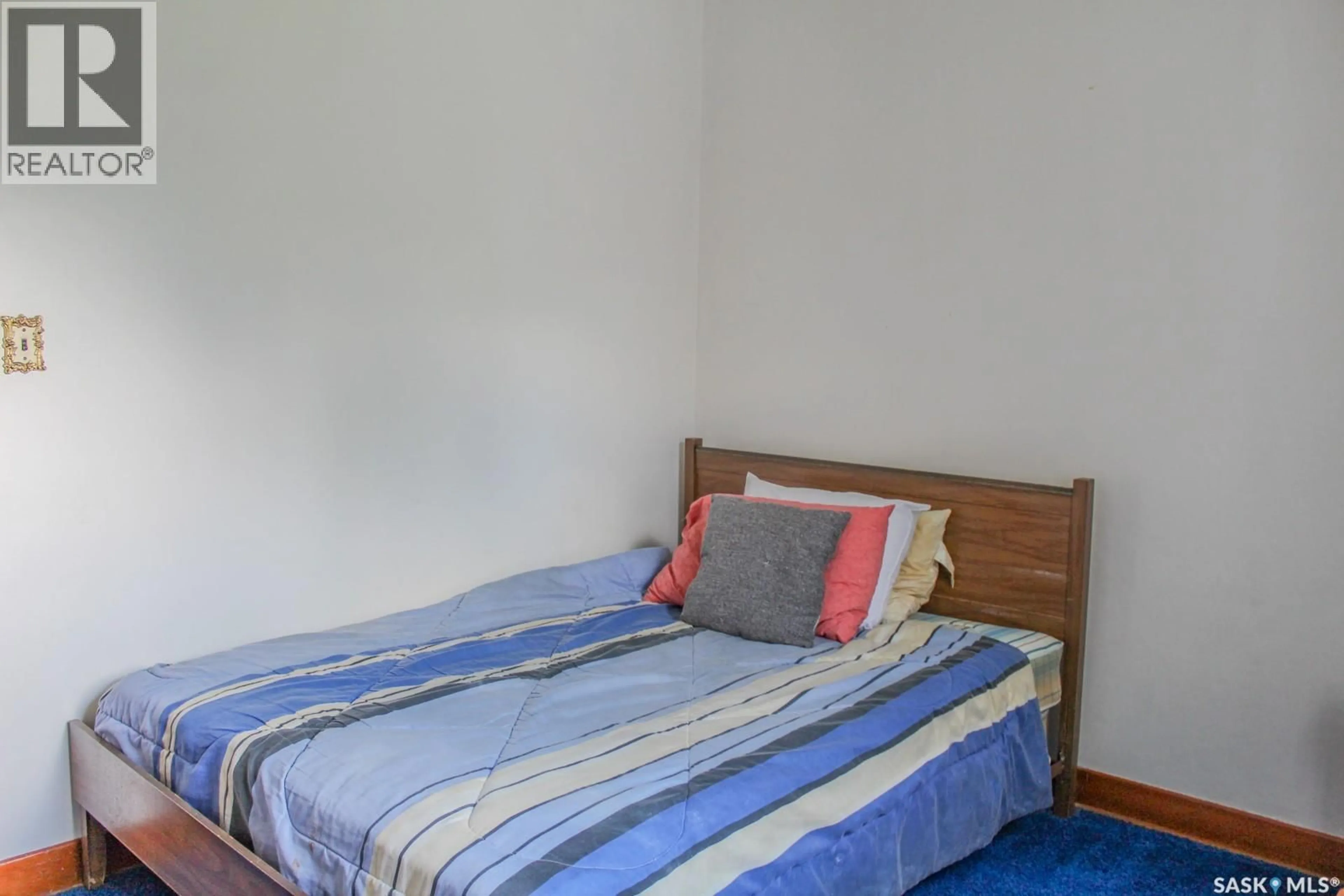 Bedroom with bed, unknown for E - 108 CRAWFORD AVENUE, Melfort Saskatchewan S0E1A0