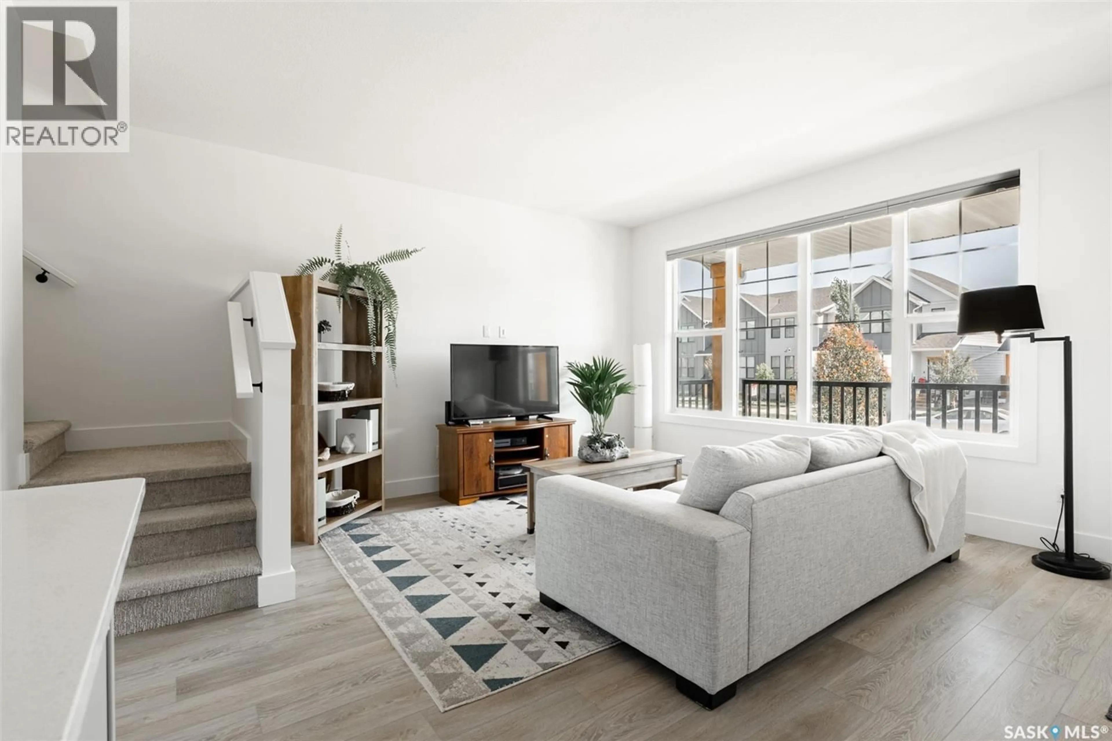 Living room with furniture, unknown for 180 ROSEWOOD BOULEVARD, Saskatoon Saskatchewan S7V0Y9