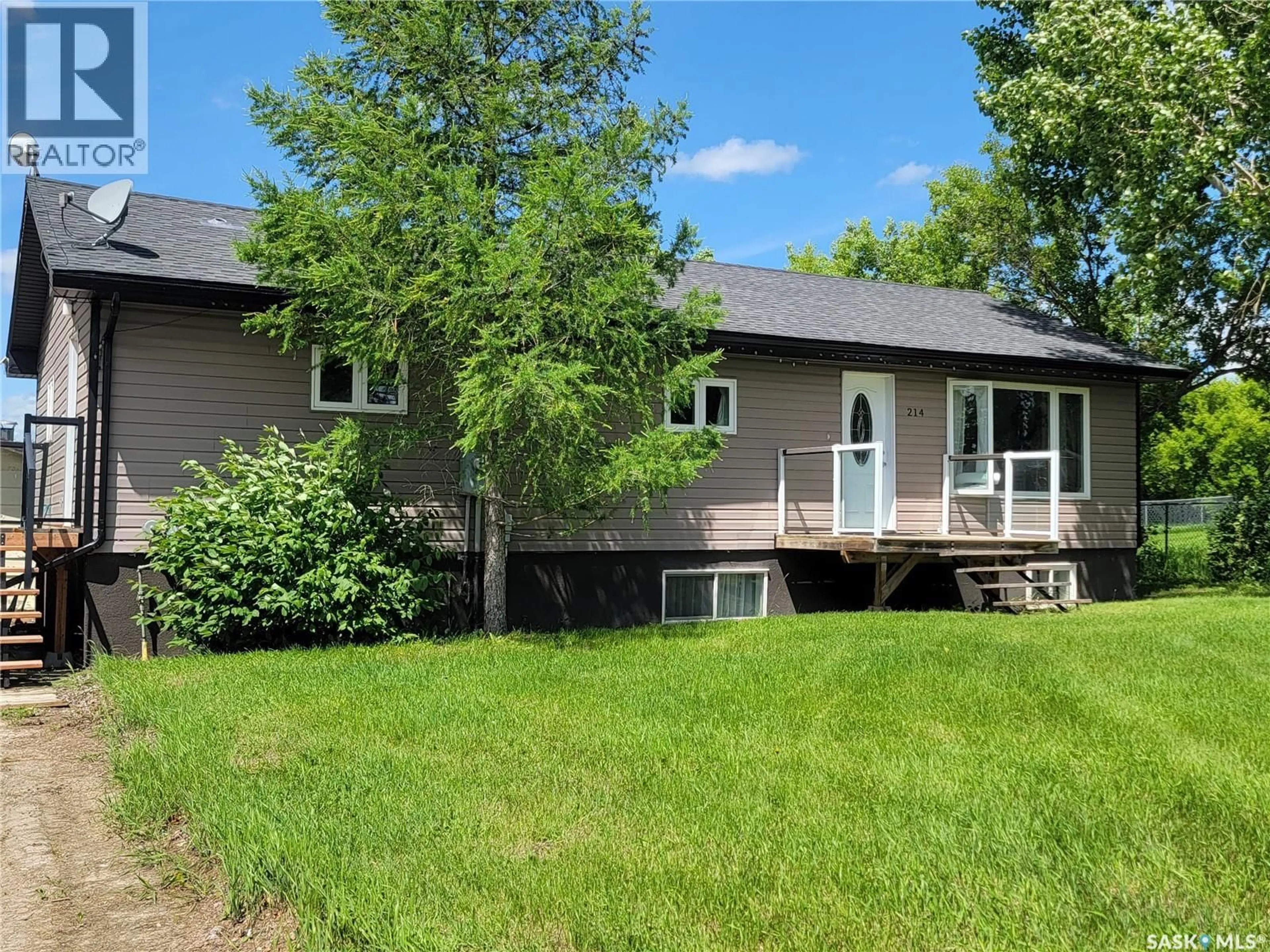 A pic from outside/outdoor area/front of a property/back of a property/a pic from drone, water/lake/river/ocean view for 214 5TH STREET, Denzil Saskatchewan S0L0S0