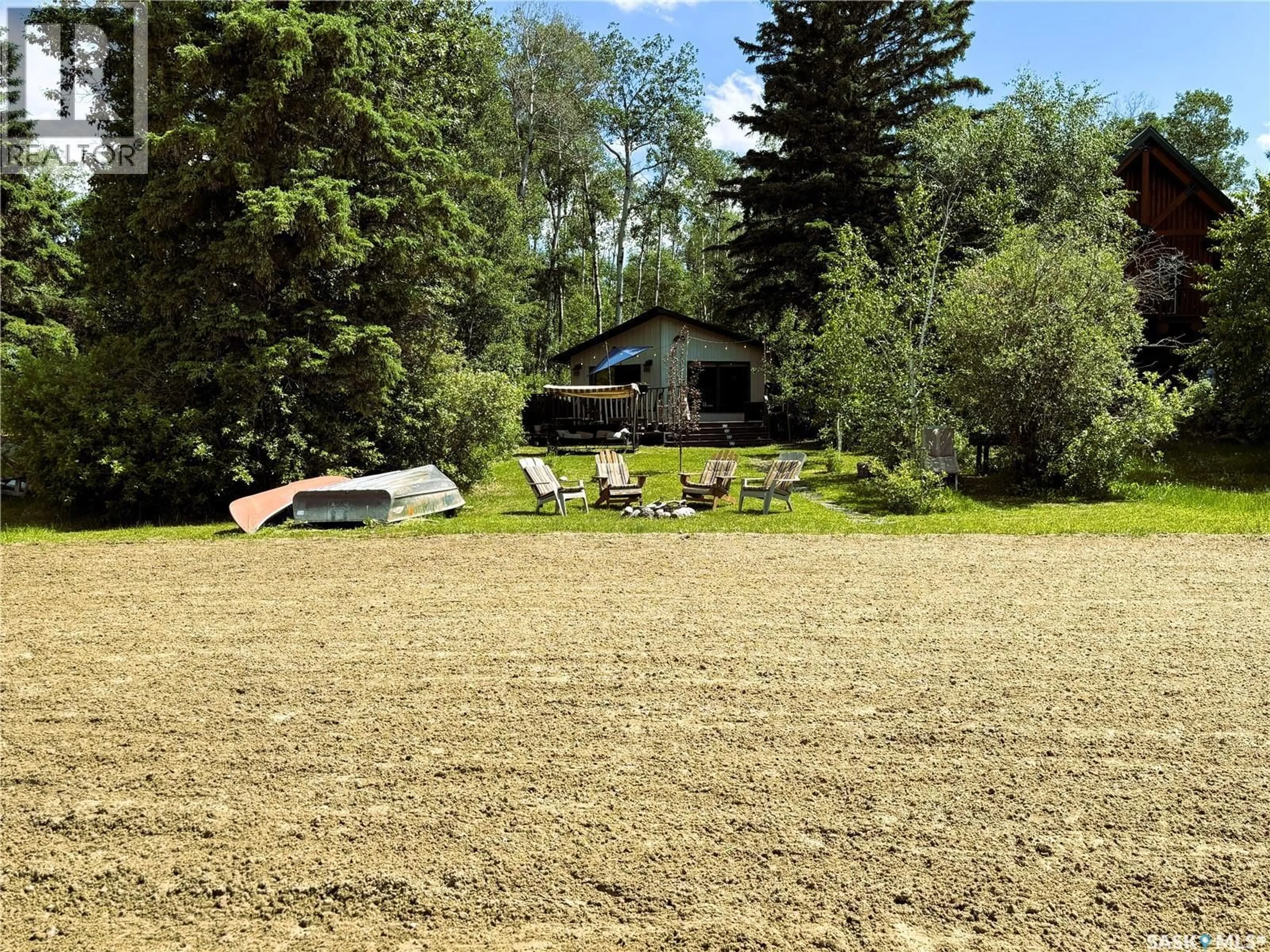 A pic from outside/outdoor area/front of a property/back of a property/a pic from drone, unknown for 266 NEIS DRIVE, Emma Lake Saskatchewan