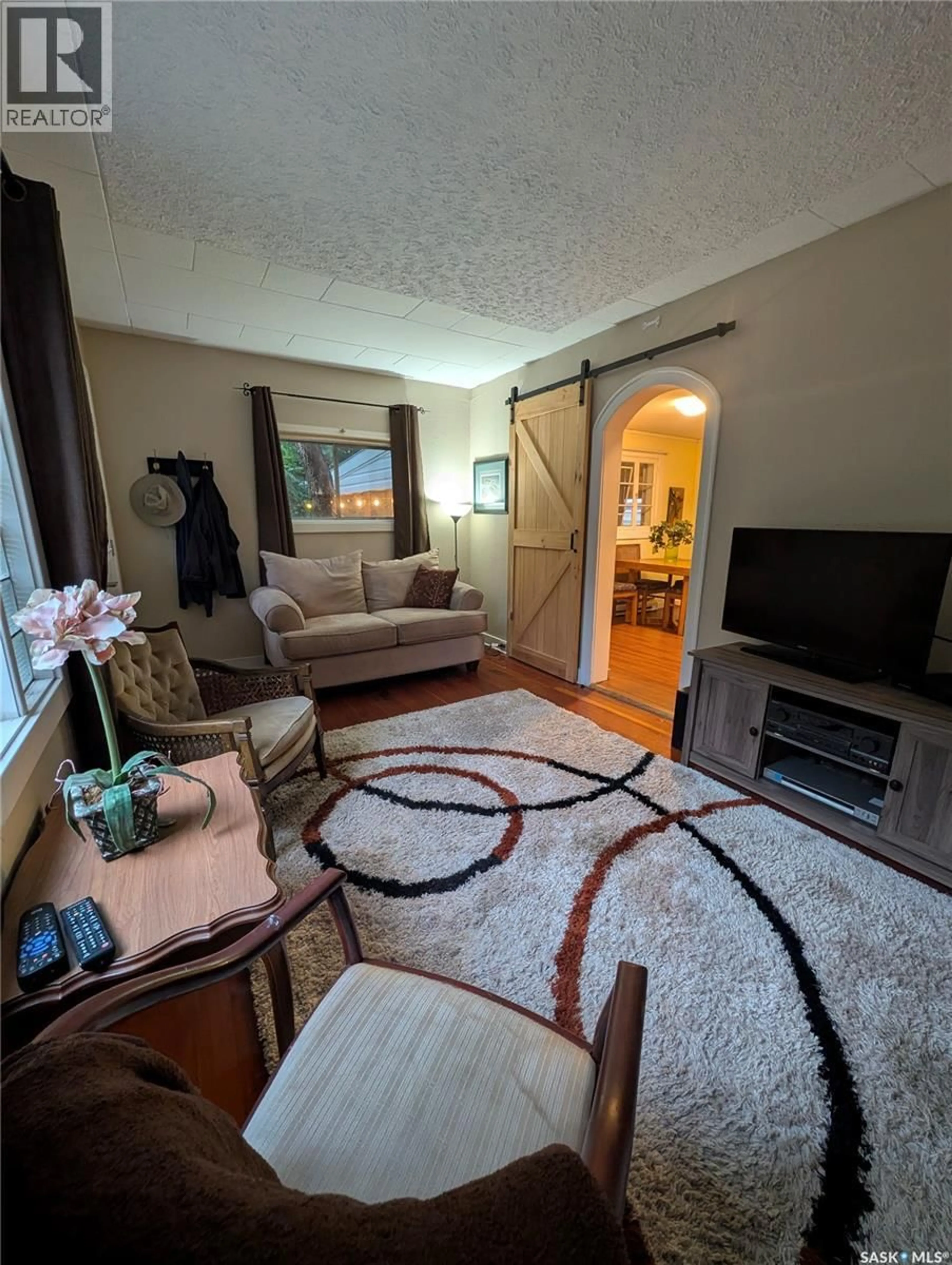 Living room with furniture, carpet floor for 106 METROPOLITAN DRIVE, South Lake Saskatchewan S6H7W6