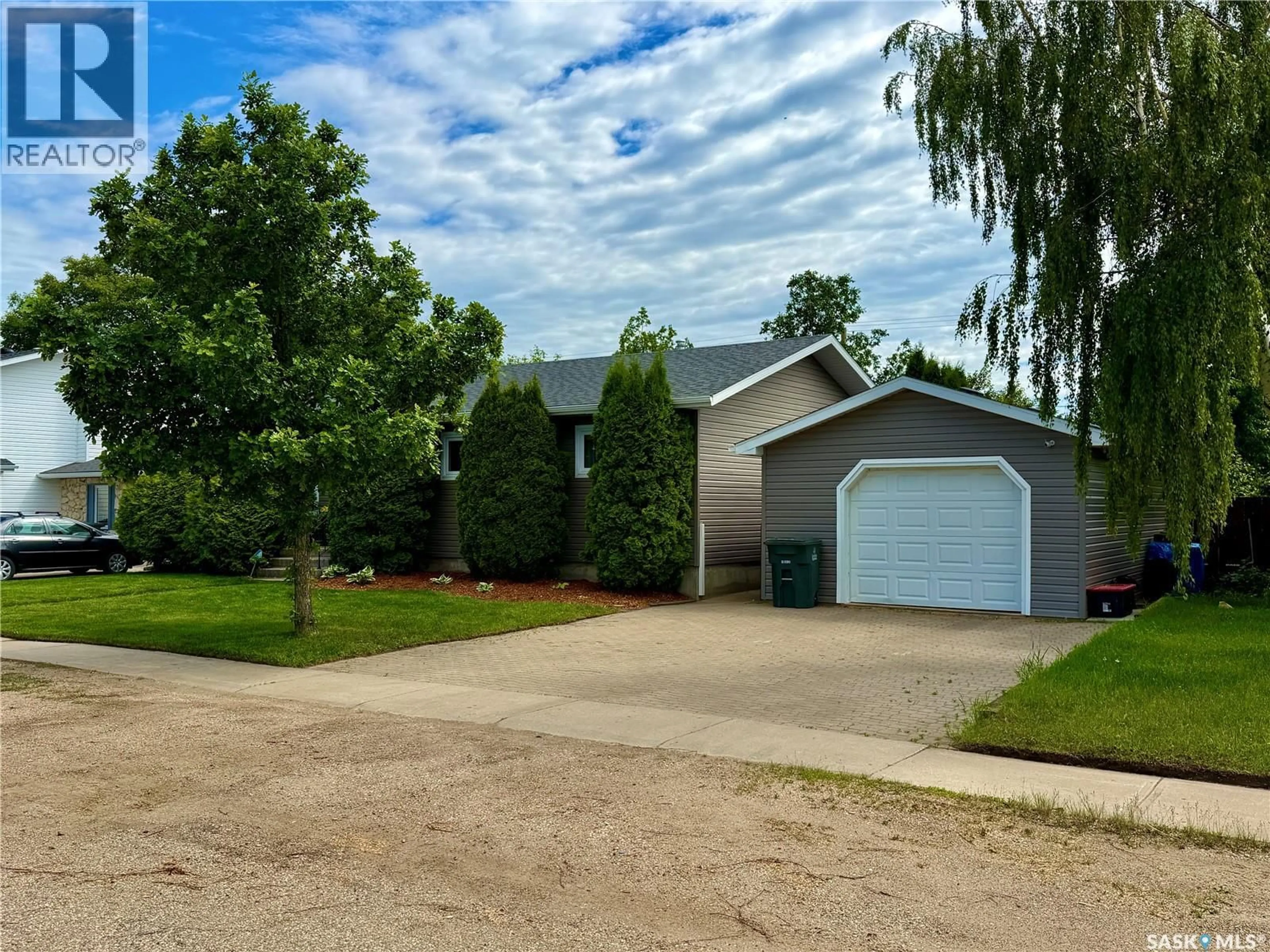A pic from outside/outdoor area/front of a property/back of a property/a pic from drone, unknown for 208 JAMES STREET, Langham Saskatchewan S0K2L0