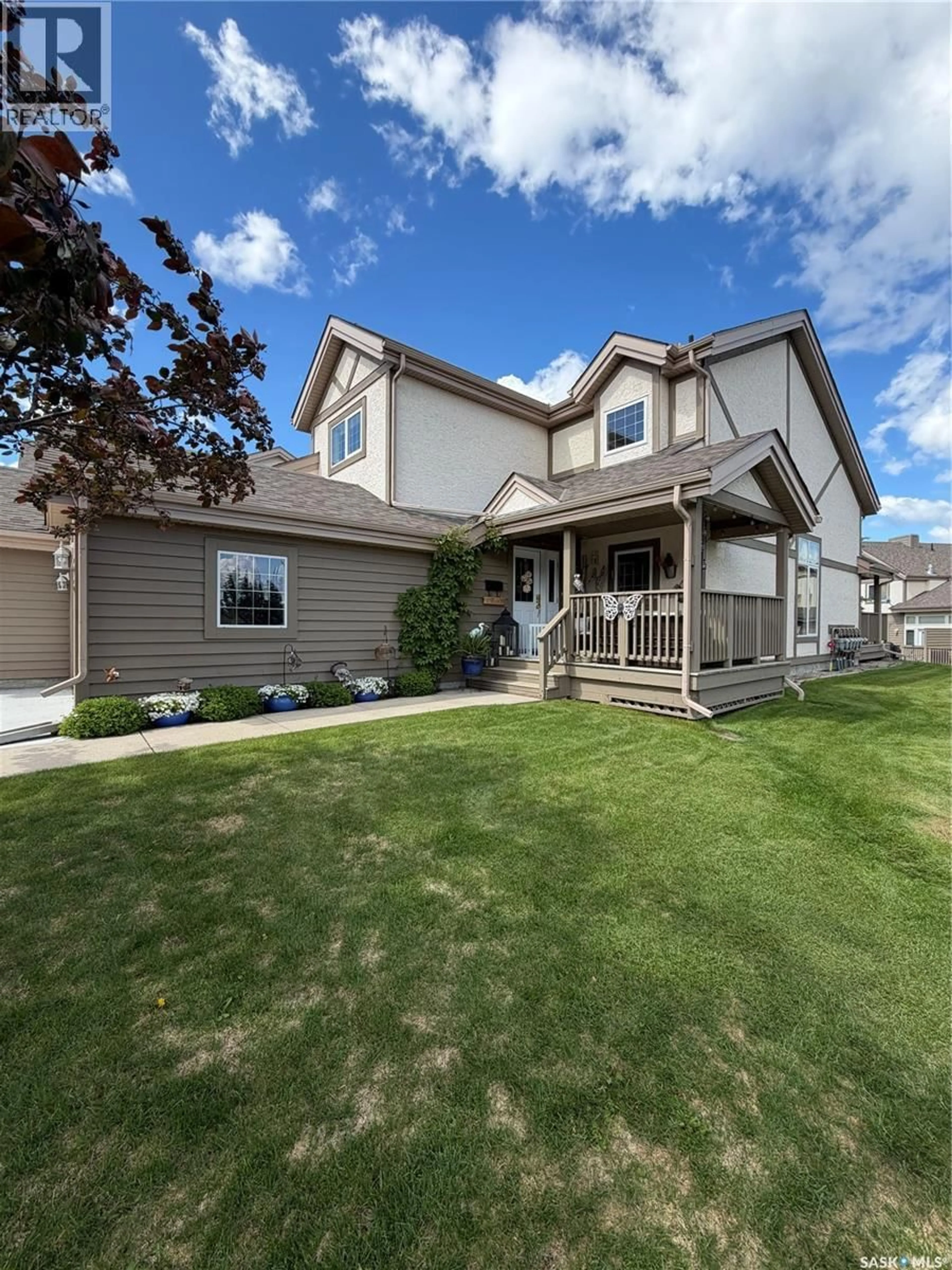 Home with vinyl exterior material, street for EAGLE VIEW WAY, Elk Ridge Saskatchewan S0J0N0