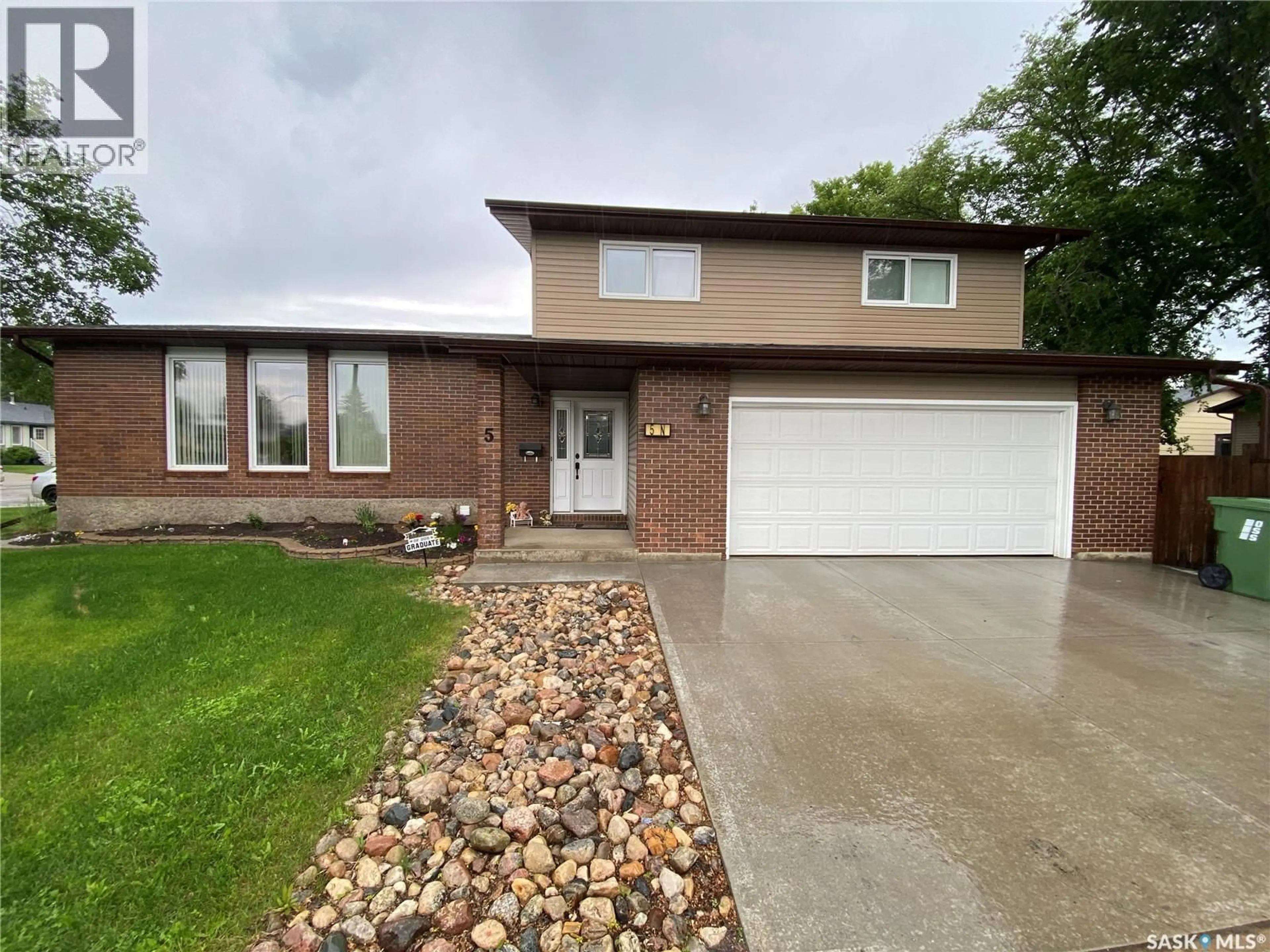 Home with brick exterior material, street for 5 MARQUIS CRESCENT, Yorkton Saskatchewan S3N3L5
