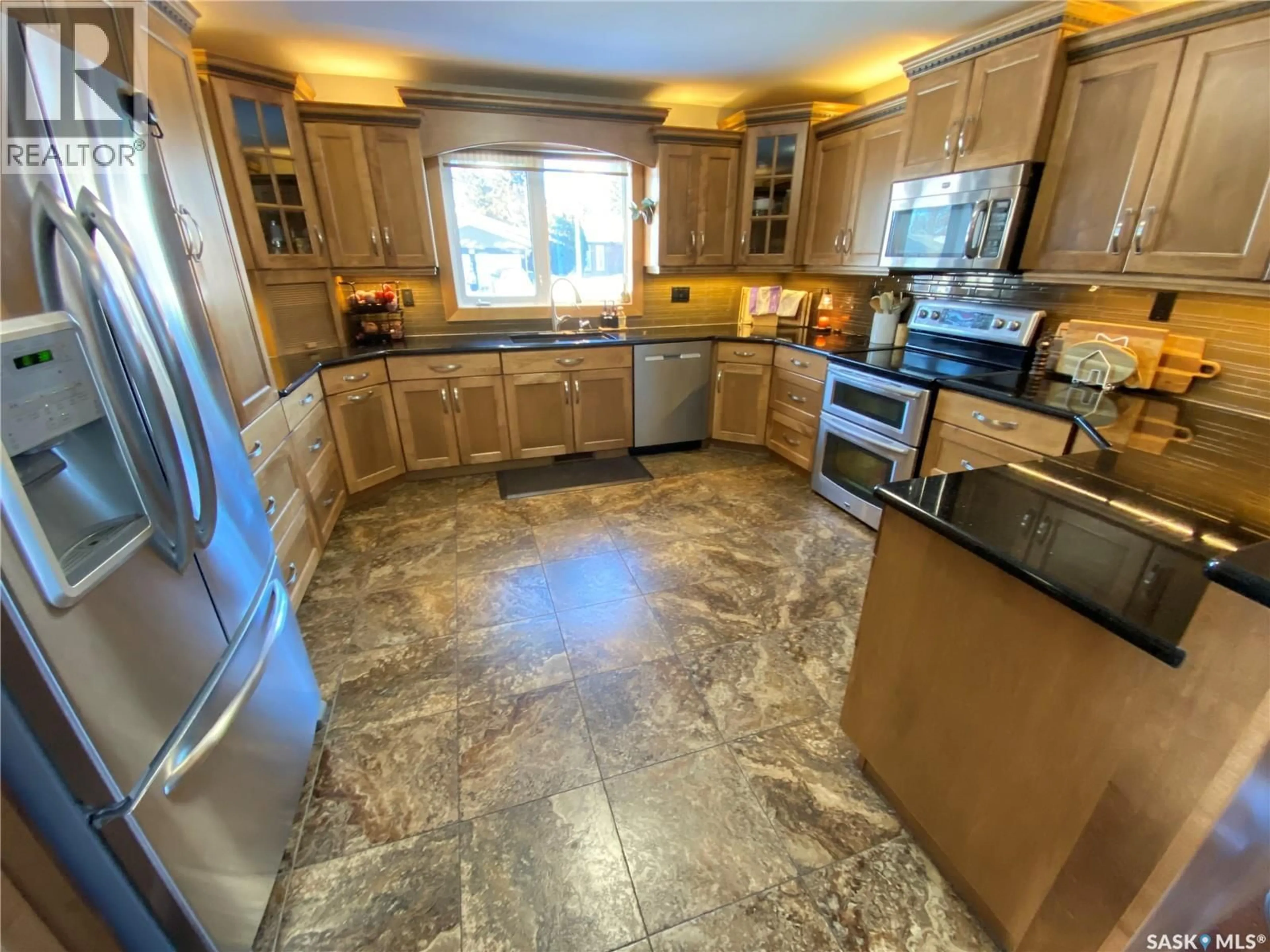 Open concept kitchen, ceramic/tile floor for 5 MARQUIS CRESCENT, Yorkton Saskatchewan S3N3L5