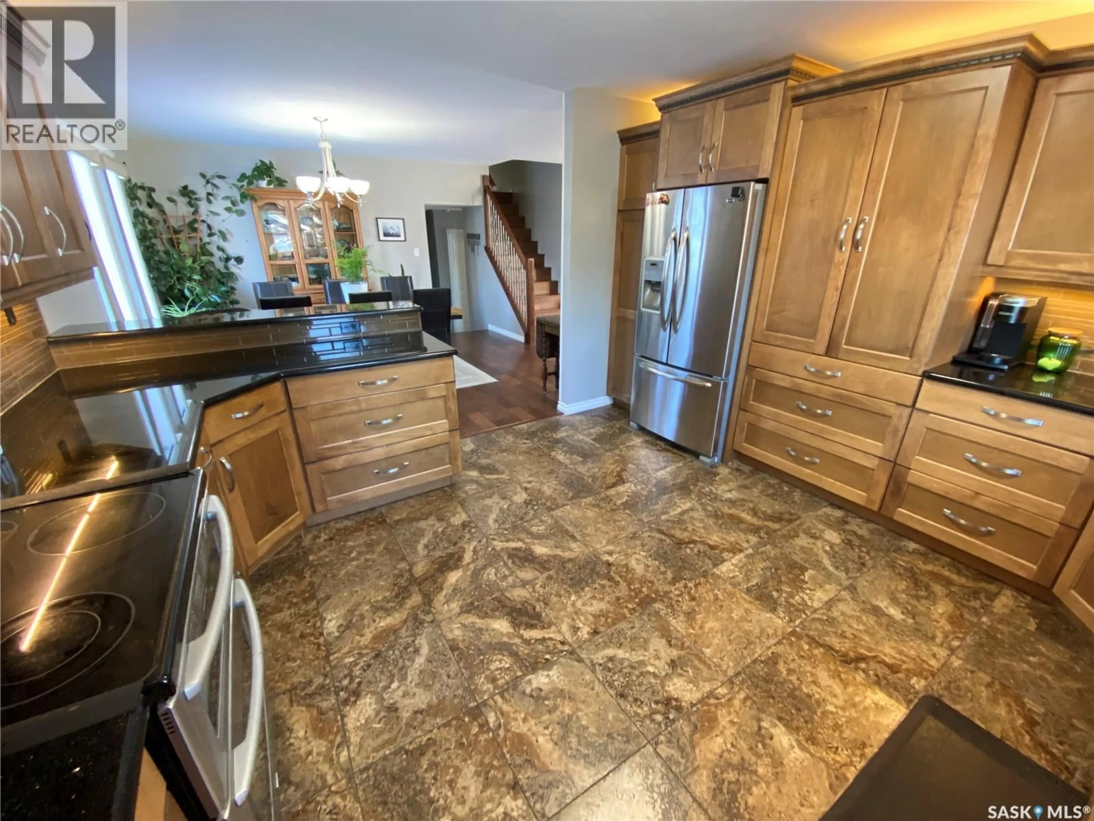 Open concept kitchen, ceramic/tile floor for 5 MARQUIS CRESCENT, Yorkton Saskatchewan S3N3L5