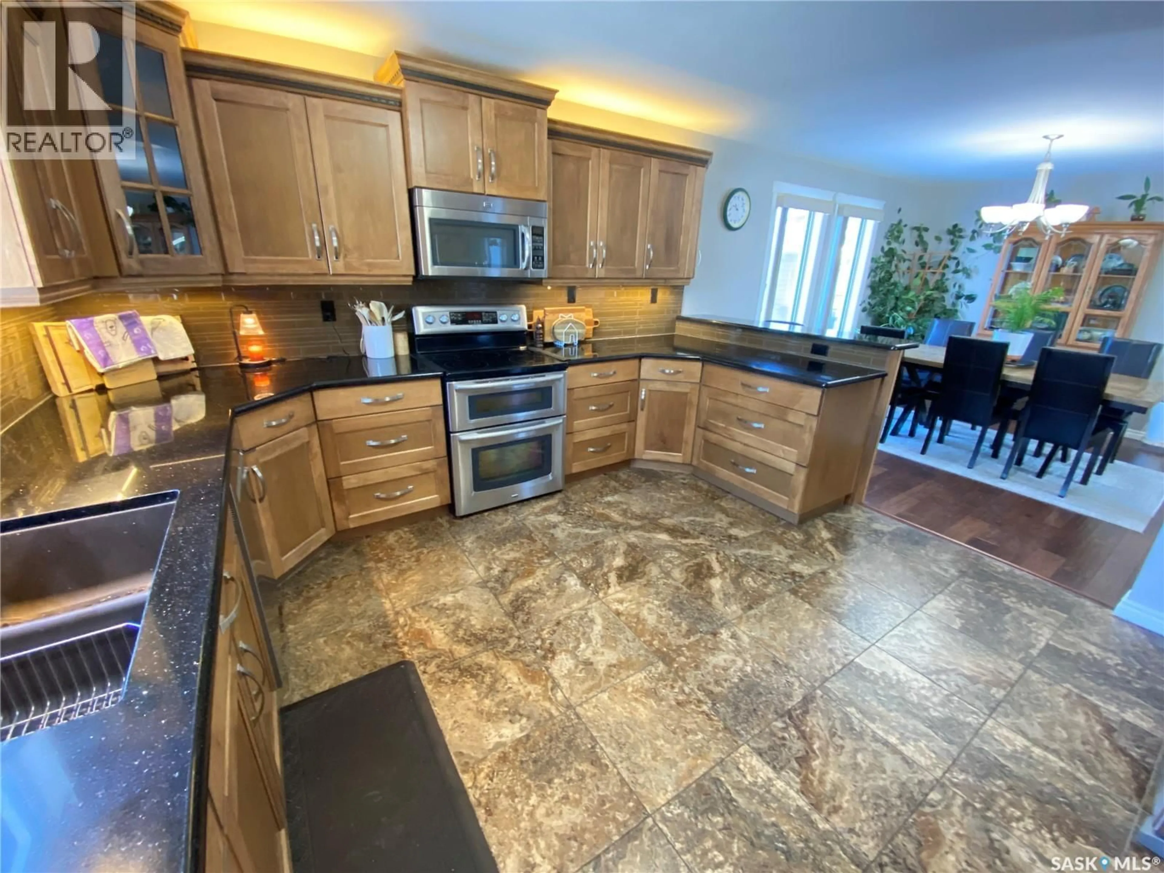 Open concept kitchen, ceramic/tile floor for 5 MARQUIS CRESCENT, Yorkton Saskatchewan S3N3L5