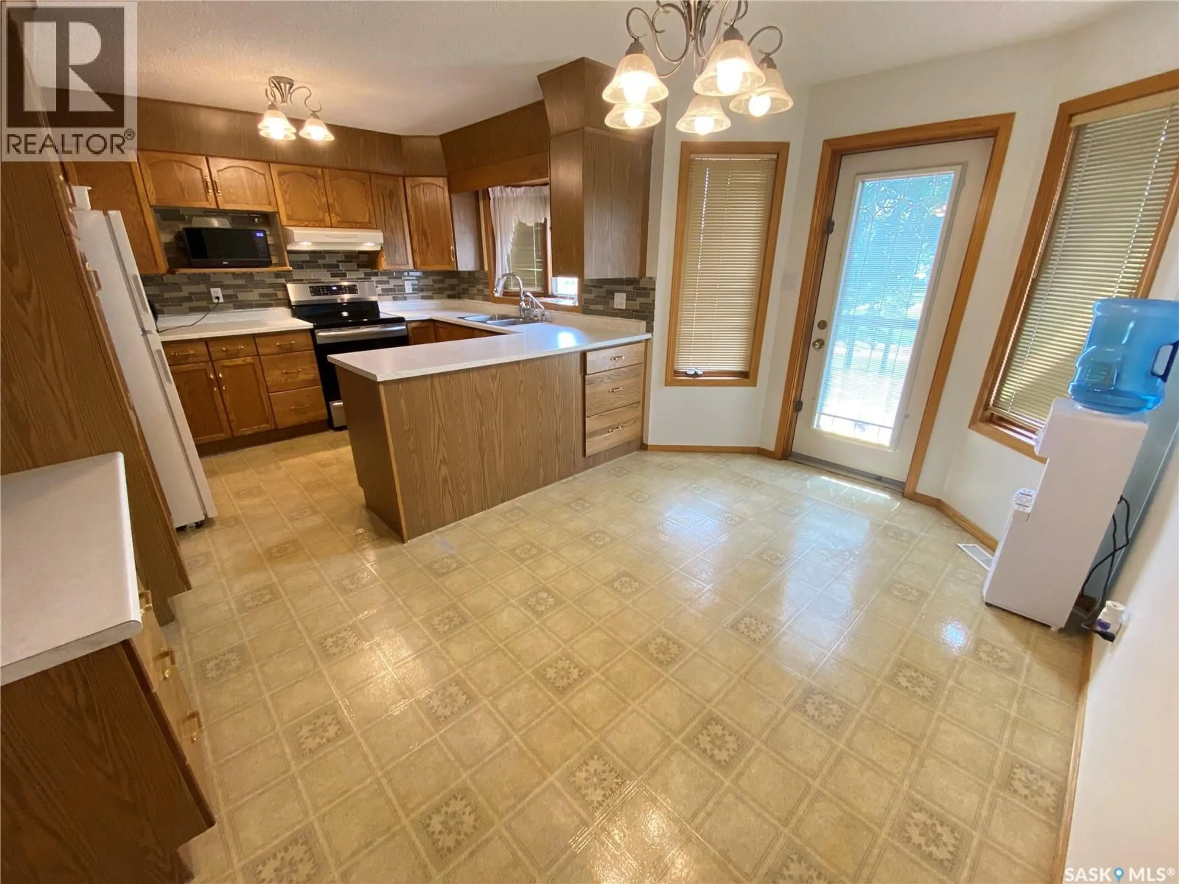 Open concept kitchen, ceramic/tile floor for 18 BLACKWELL CRESCENT, Yorkton Saskatchewan S3N3Y3