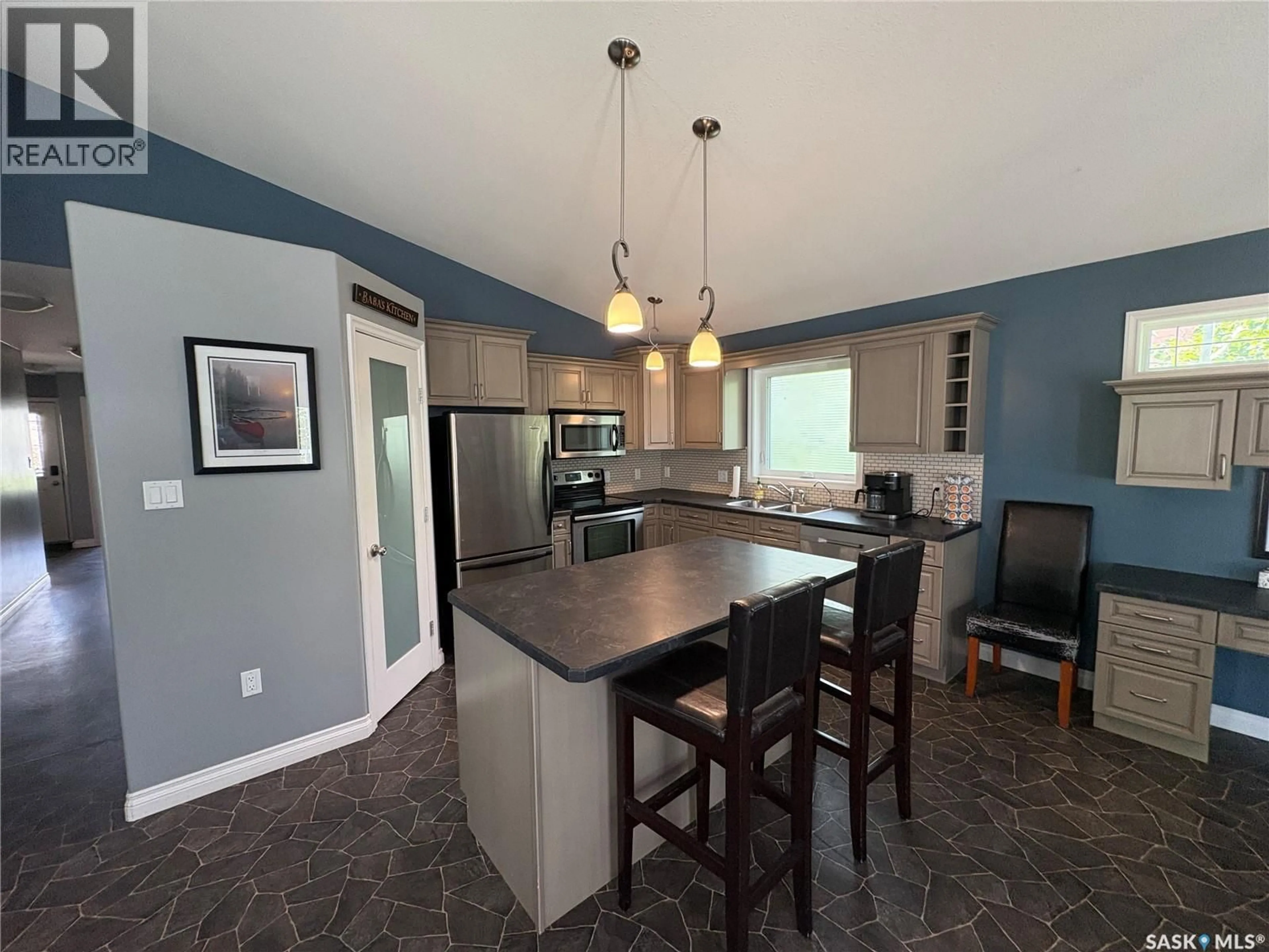 Open concept kitchen, ceramic/tile floor for 33 MERCEDES BAY, Fishing Lake Saskatchewan S0A4J0