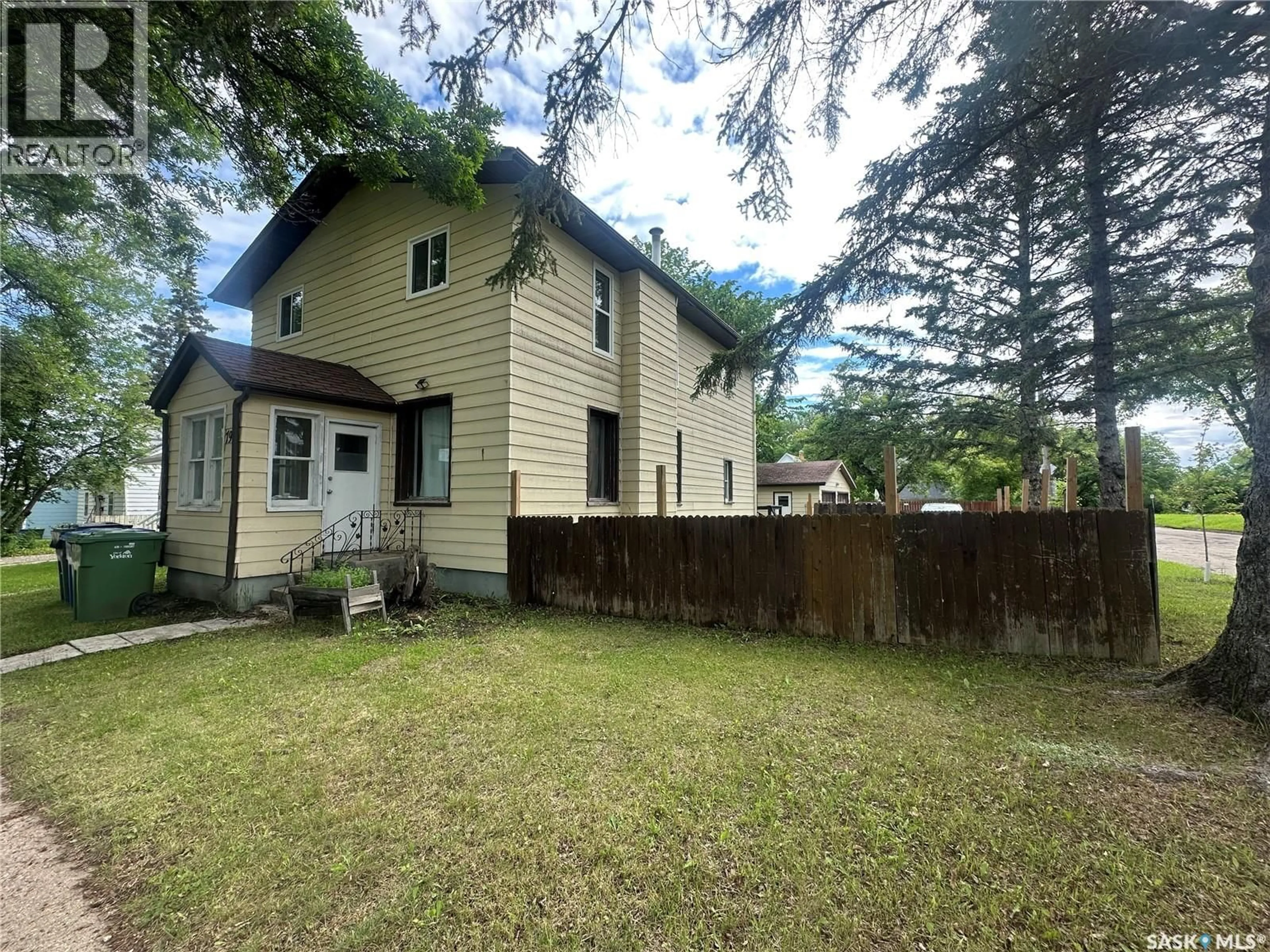 A pic from outside/outdoor area/front of a property/back of a property/a pic from drone, street for 79 AGRICULTURAL AVENUE, Yorkton Saskatchewan S3N1S2