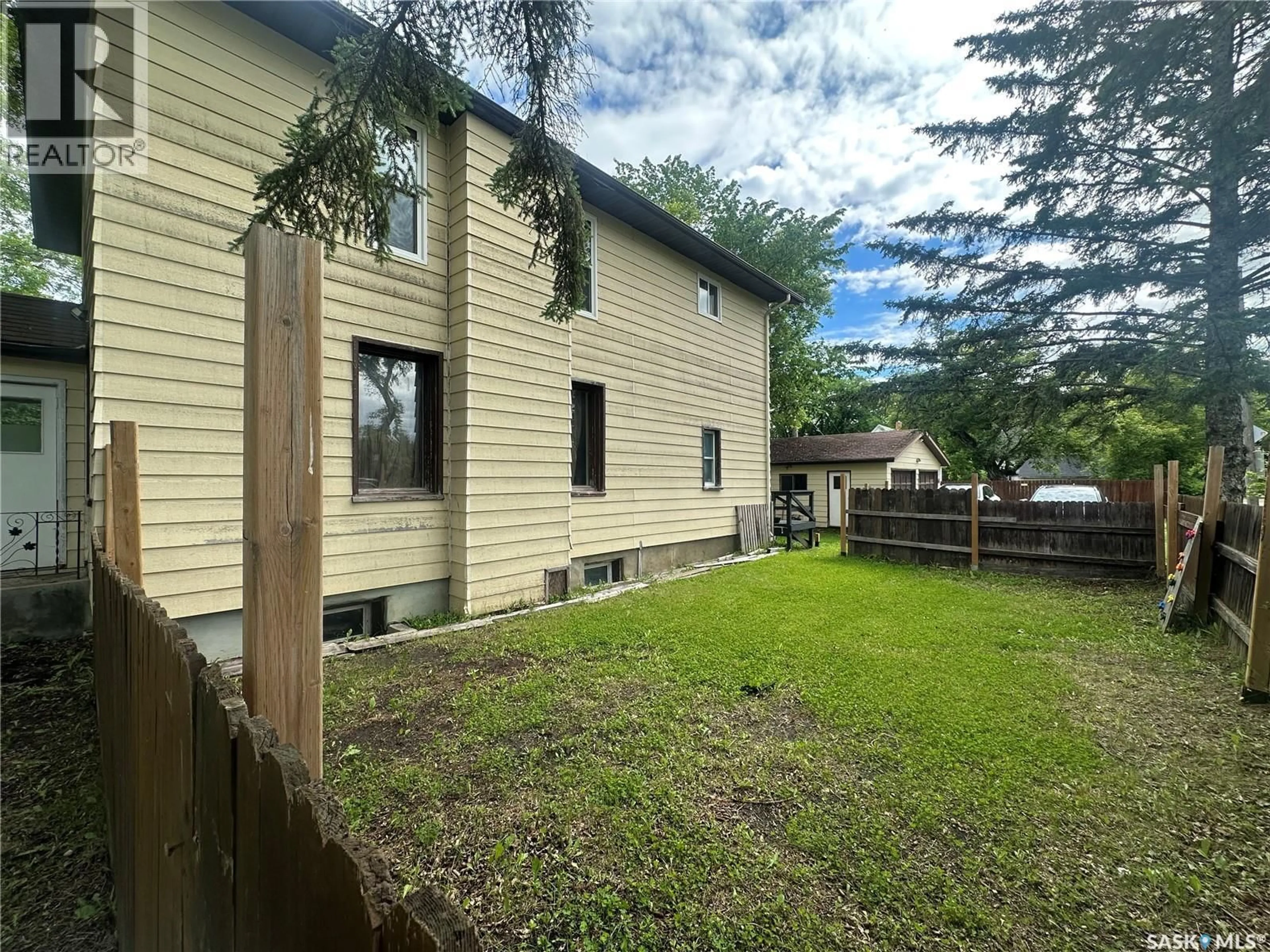 A pic from outside/outdoor area/front of a property/back of a property/a pic from drone, unknown for 79 AGRICULTURAL AVENUE, Yorkton Saskatchewan S3N1S2