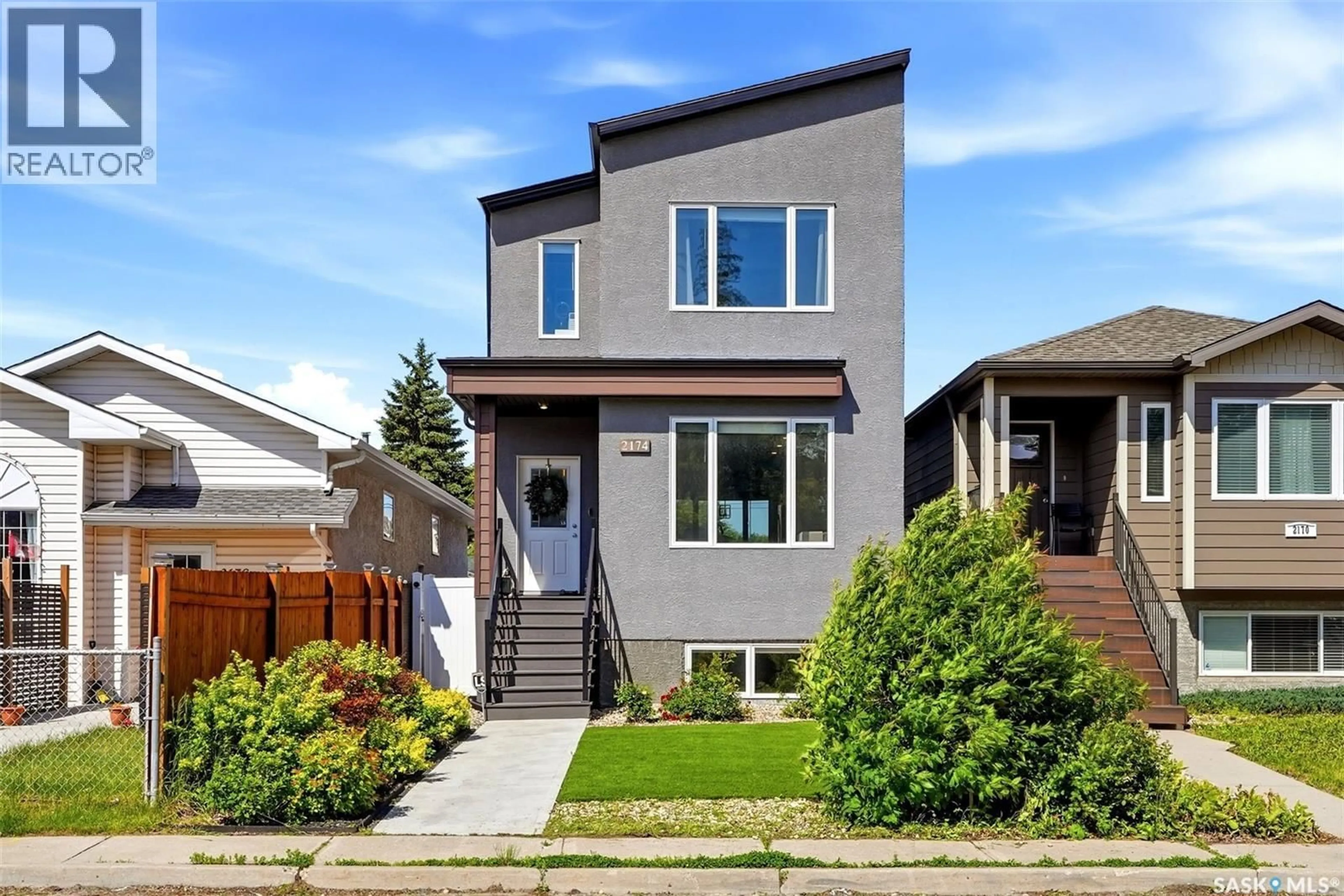 Home with vinyl exterior material, street for 2174 ELLIOTT STREET, Regina Saskatchewan S4N3H2