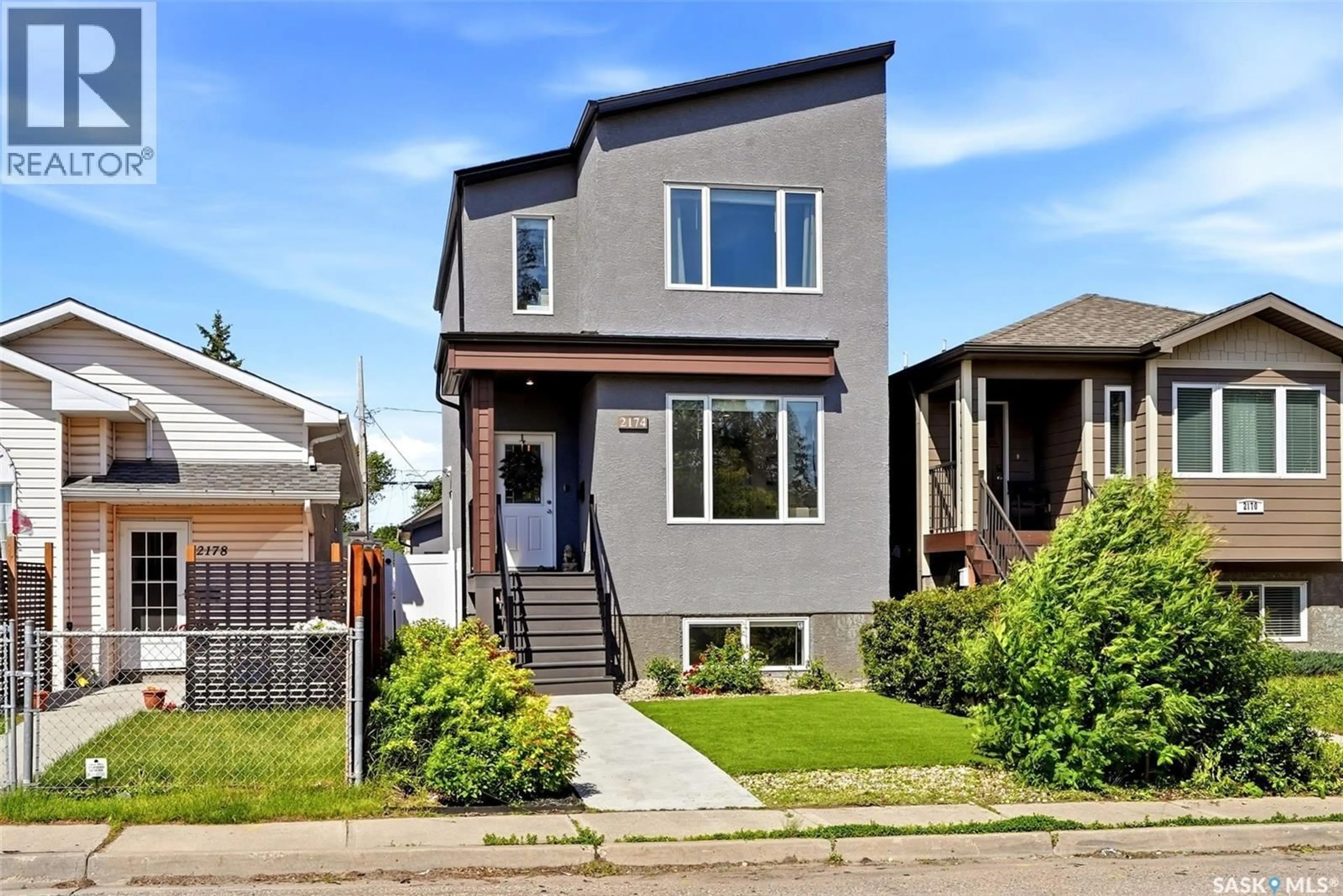 Home with brick exterior material, street for 2174 ELLIOTT STREET, Regina Saskatchewan S4N3H2
