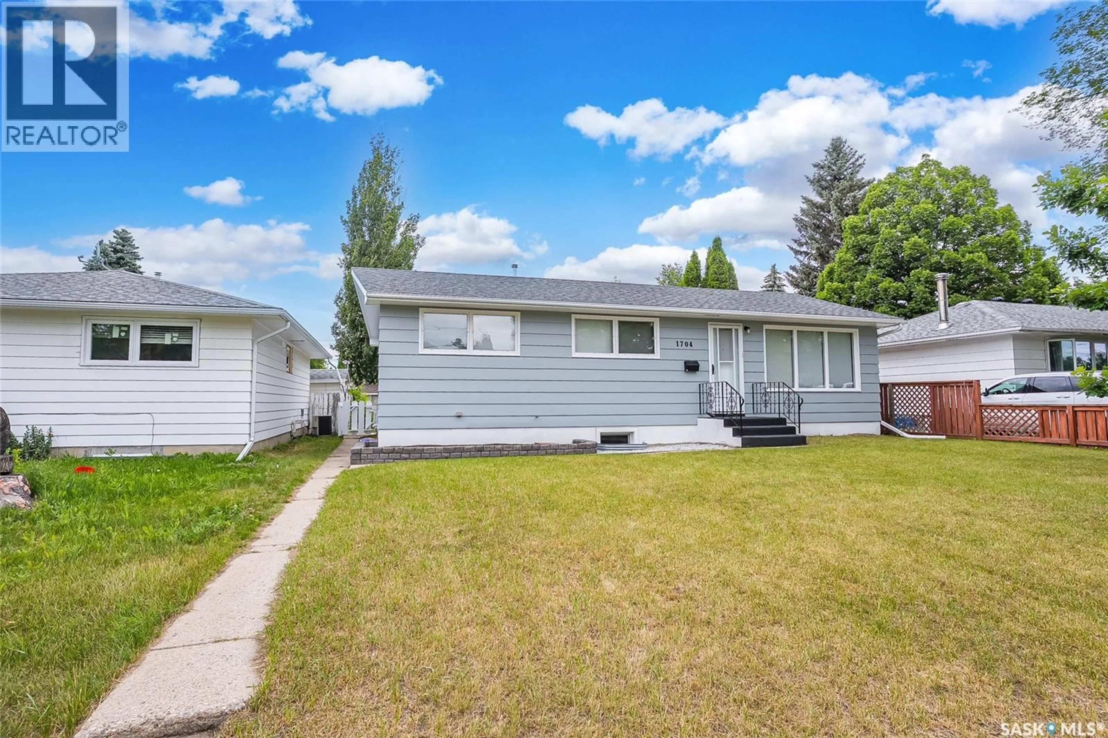 Home with vinyl exterior material, street for S - 1704 PRESTON AVENUE, Saskatoon Saskatchewan S7H2V8