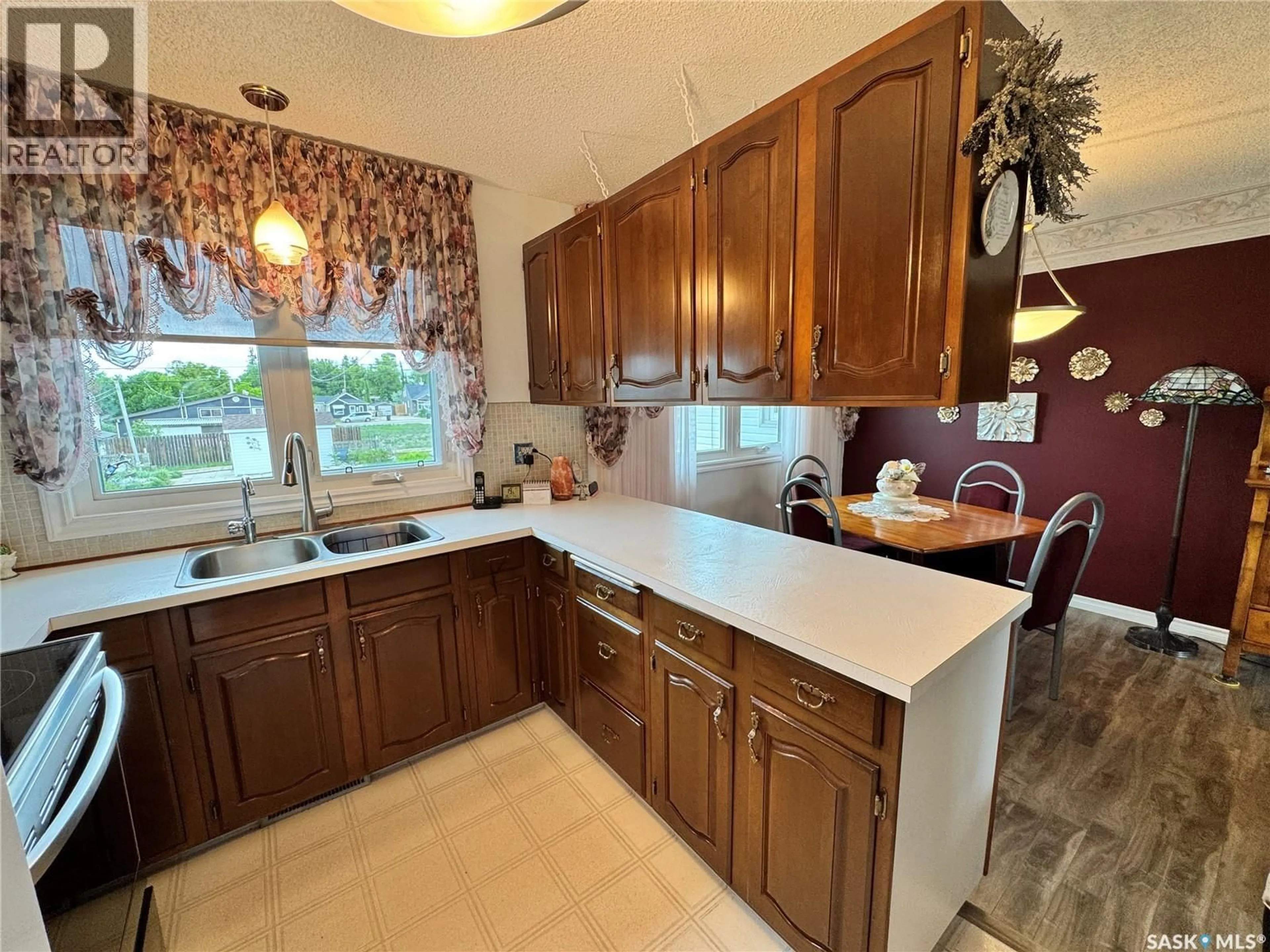 Standard kitchen, ceramic/tile floor for 313 5TH AVENUE, Biggar Saskatchewan S0K0M0